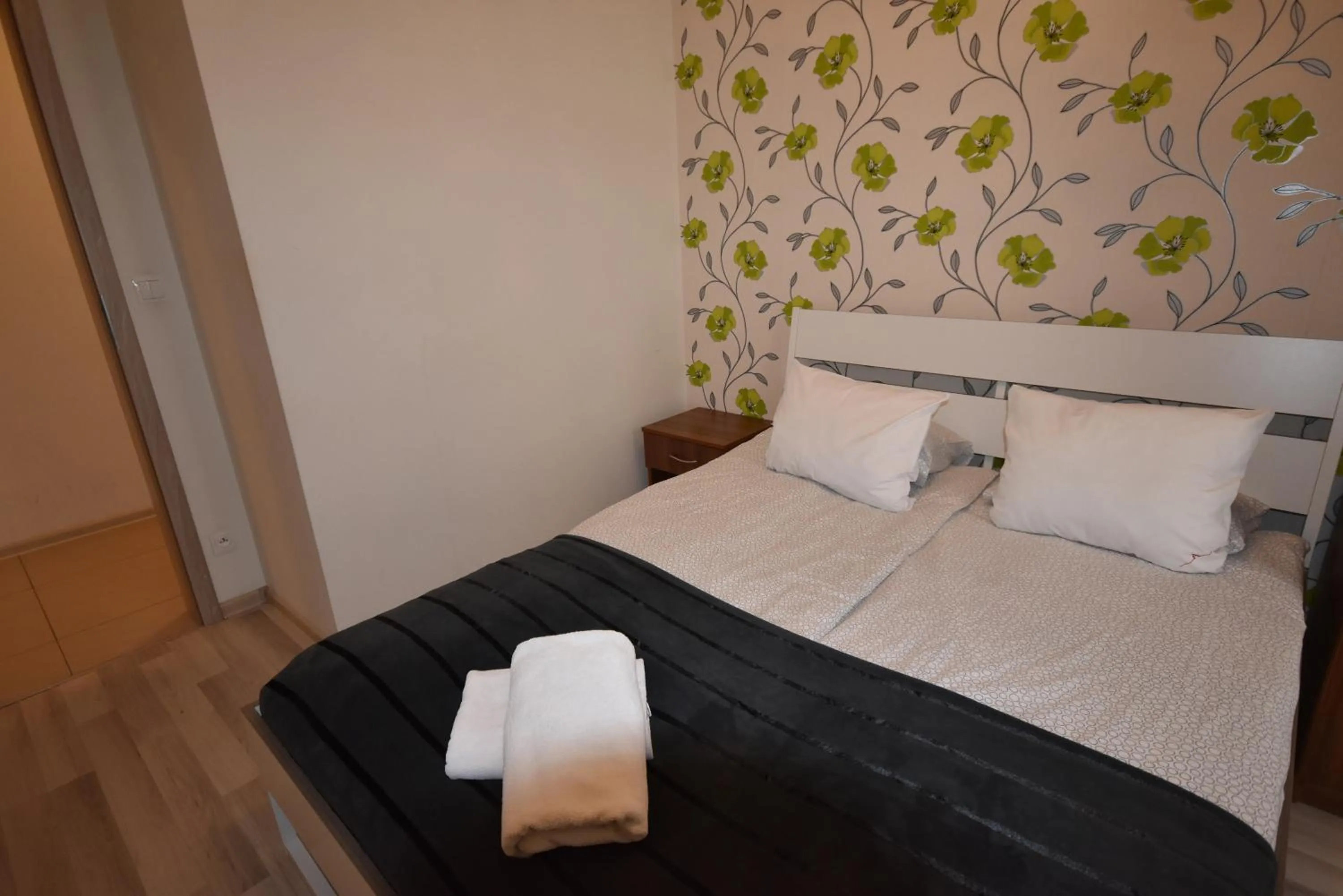 Bed in NotaBene Wola Apartment