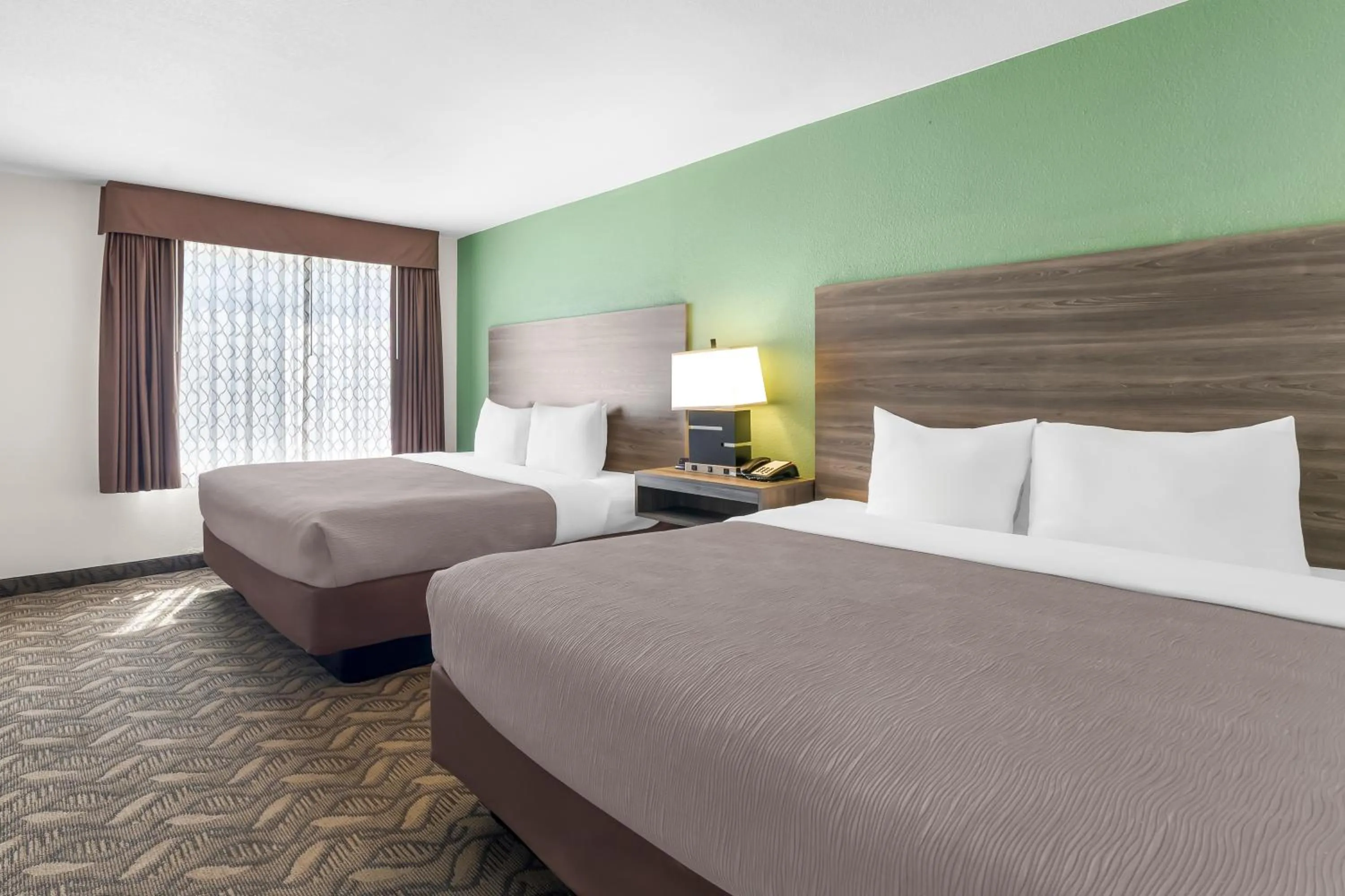 Bed in Quality Inn & Suites Salt Lake City Airport West