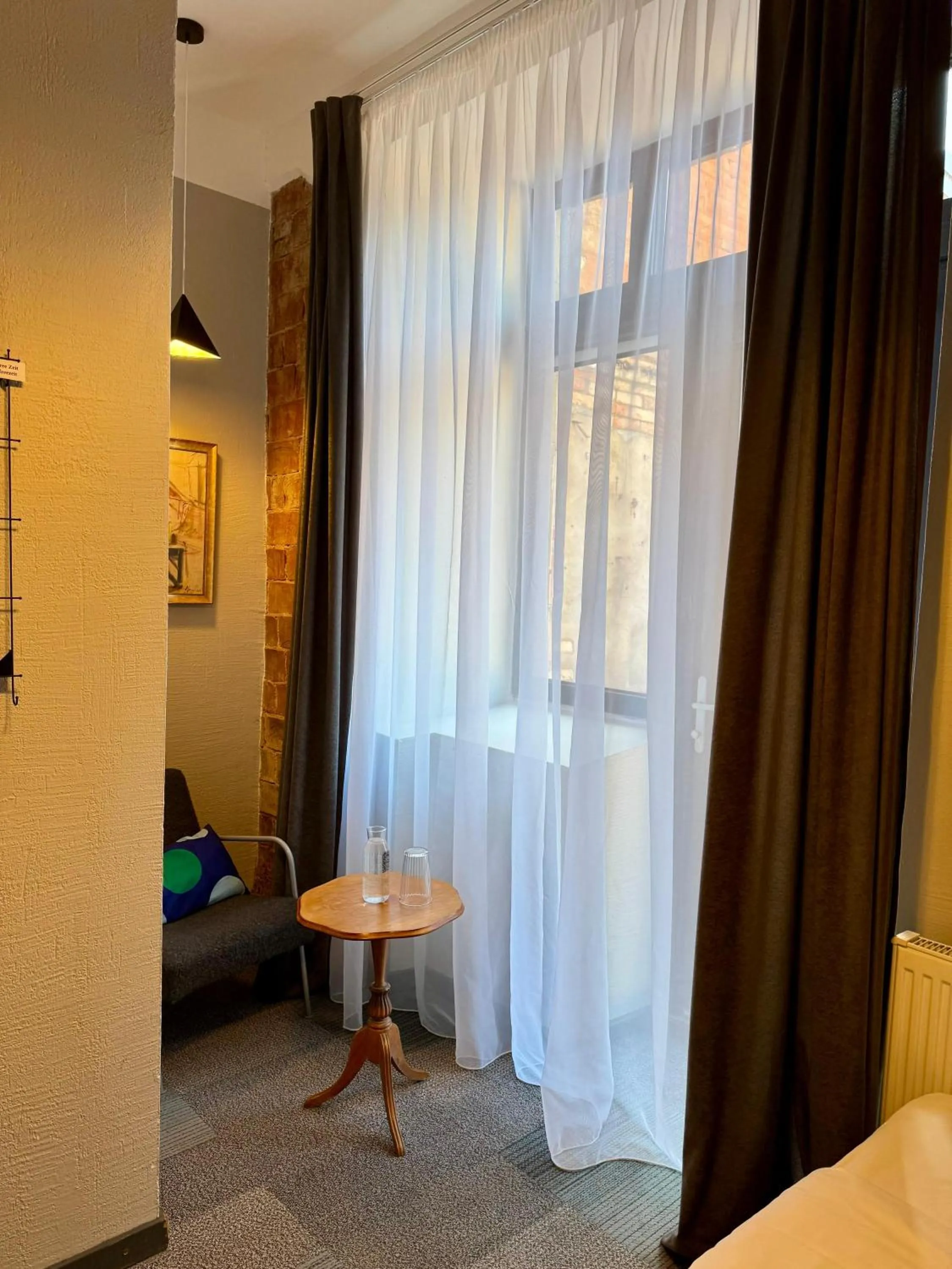 Seating area, Bed in Zeit Hotel