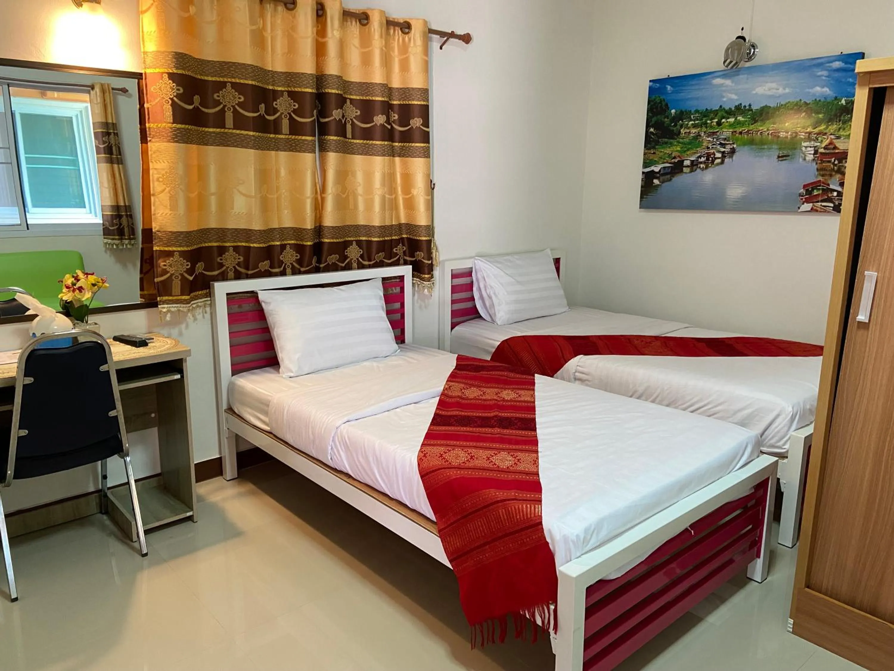 Bed in บุญจินดา รีสอร์ท