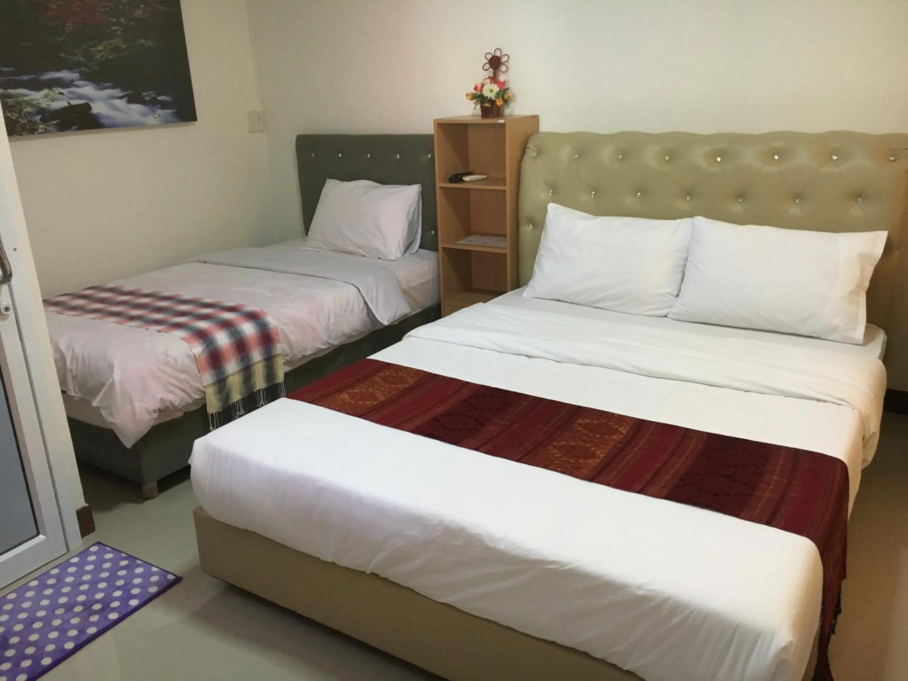 Bed in บุญจินดา รีสอร์ท