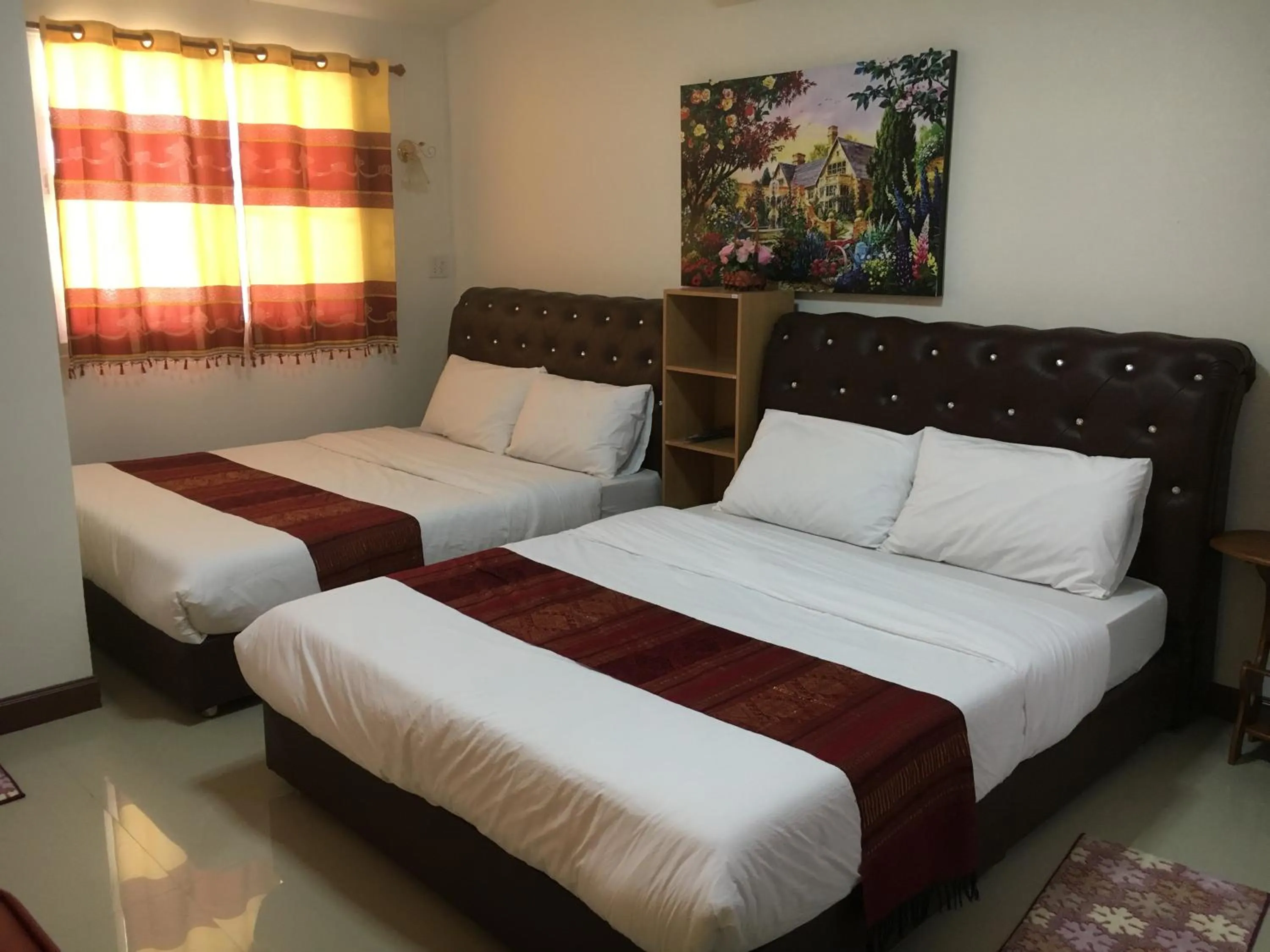 Bed in บุญจินดา รีสอร์ท