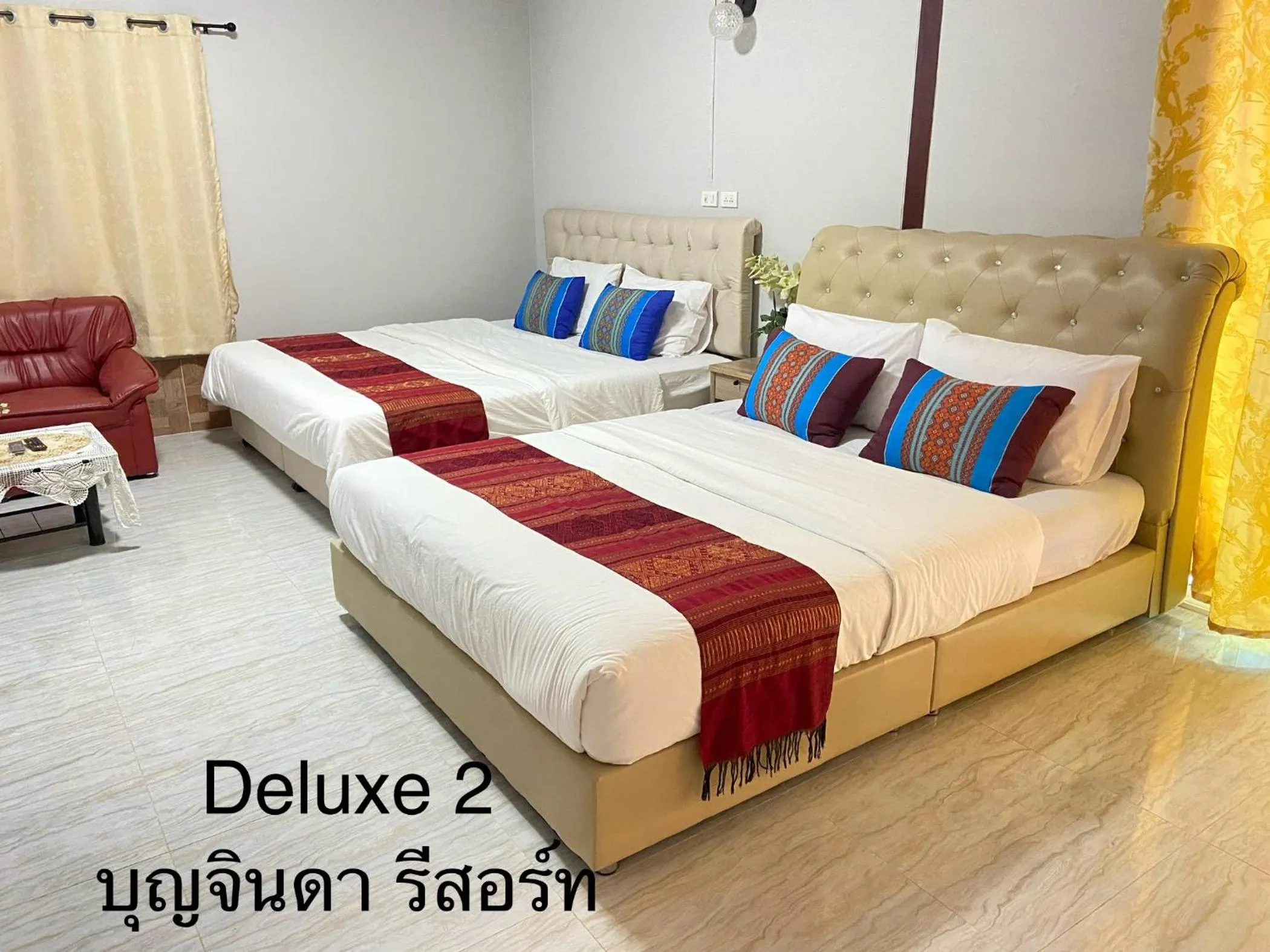Bed in บุญจินดา รีสอร์ท
