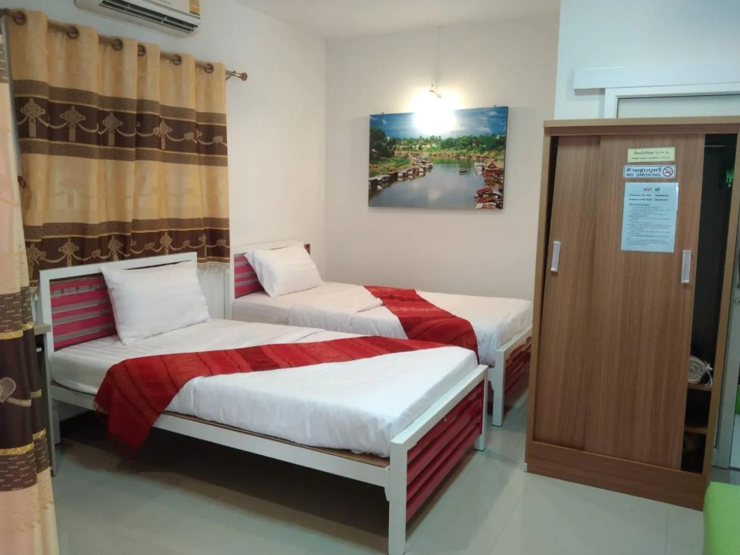 Bed in บุญจินดา รีสอร์ท