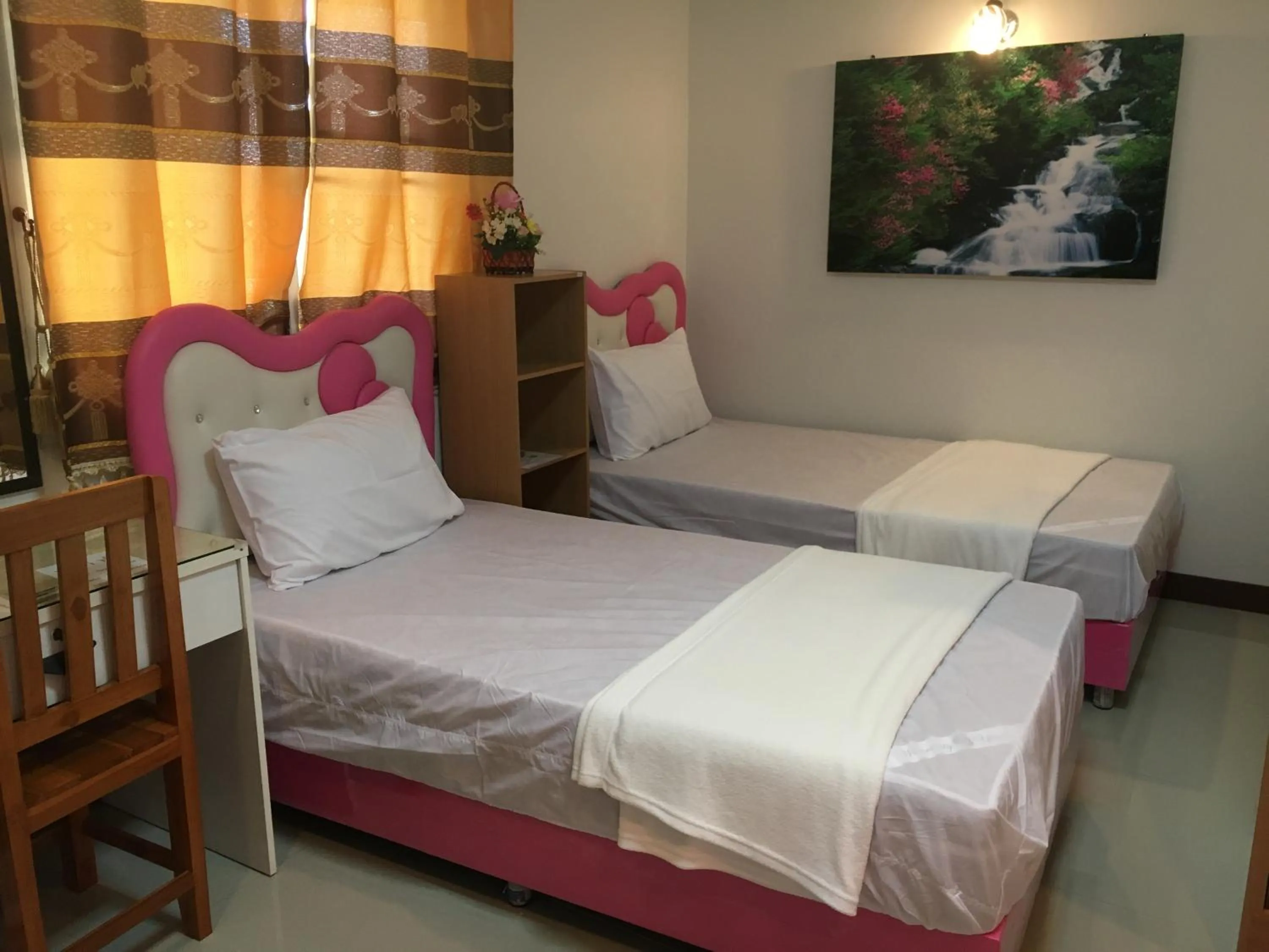 Bed in บุญจินดา รีสอร์ท