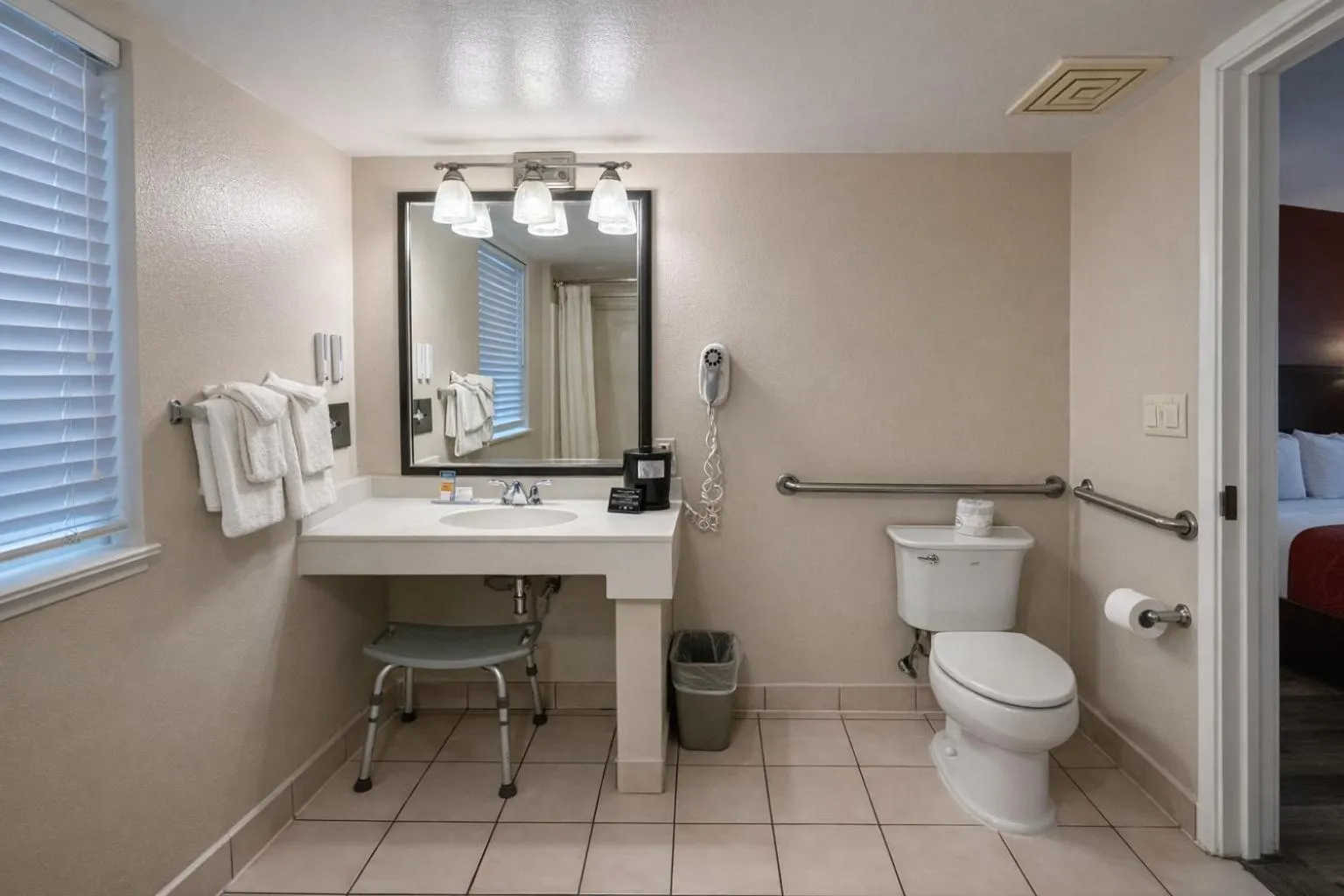 Toilet in Bay Breeze Inn