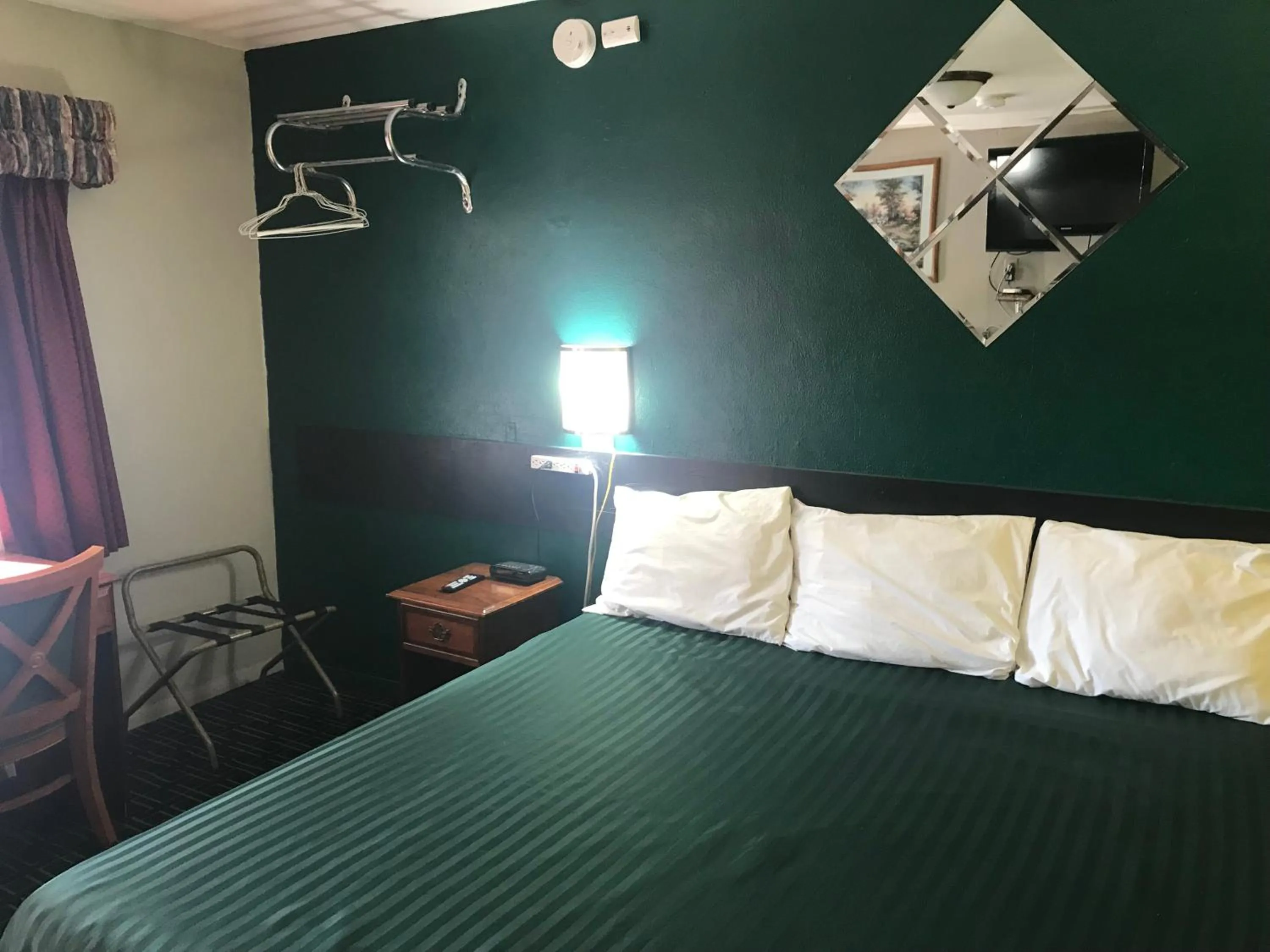 Bed in Cooper Motel Tuscola