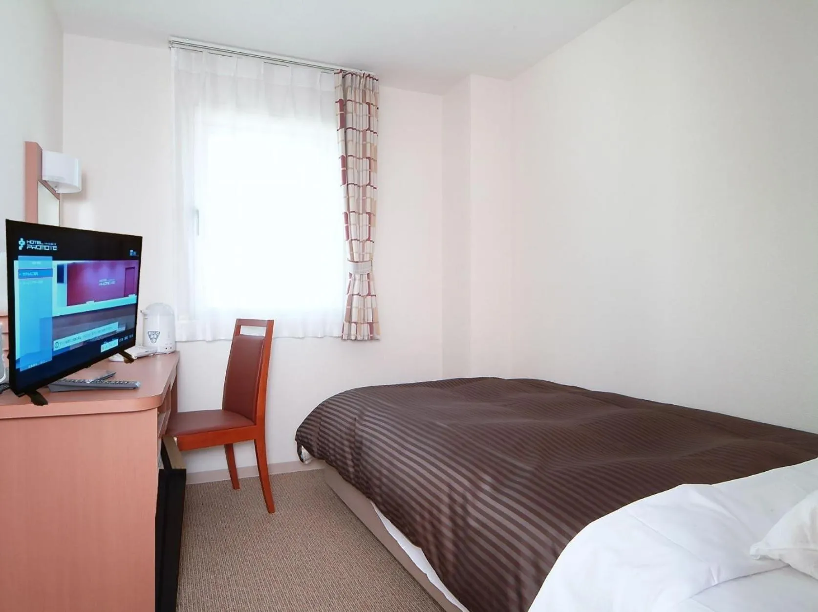 Bed in Hotel Promote Hakodate