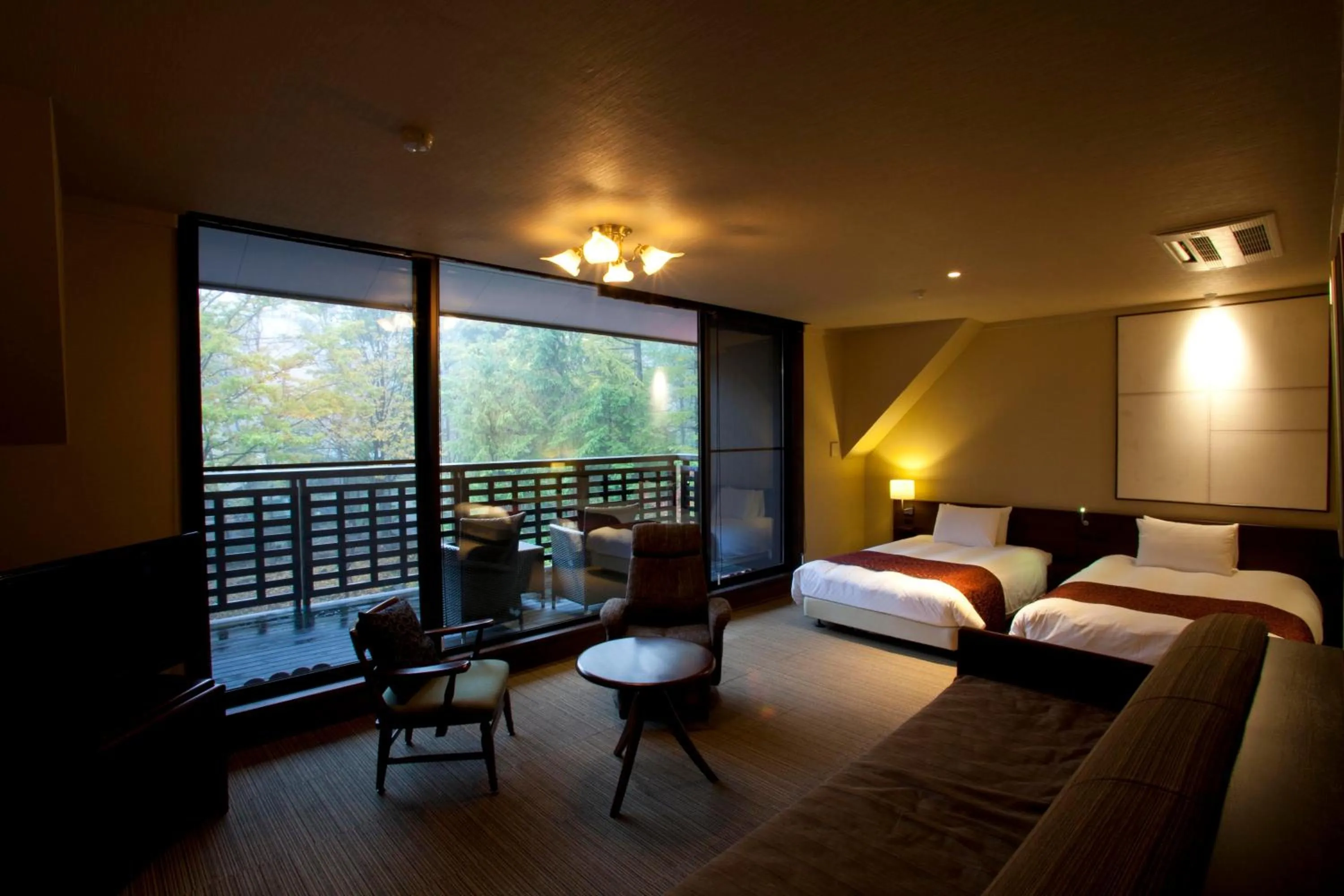 Photo of the whole room, Bed in Takayama Wan Wan Paradise Hotel & Cottage