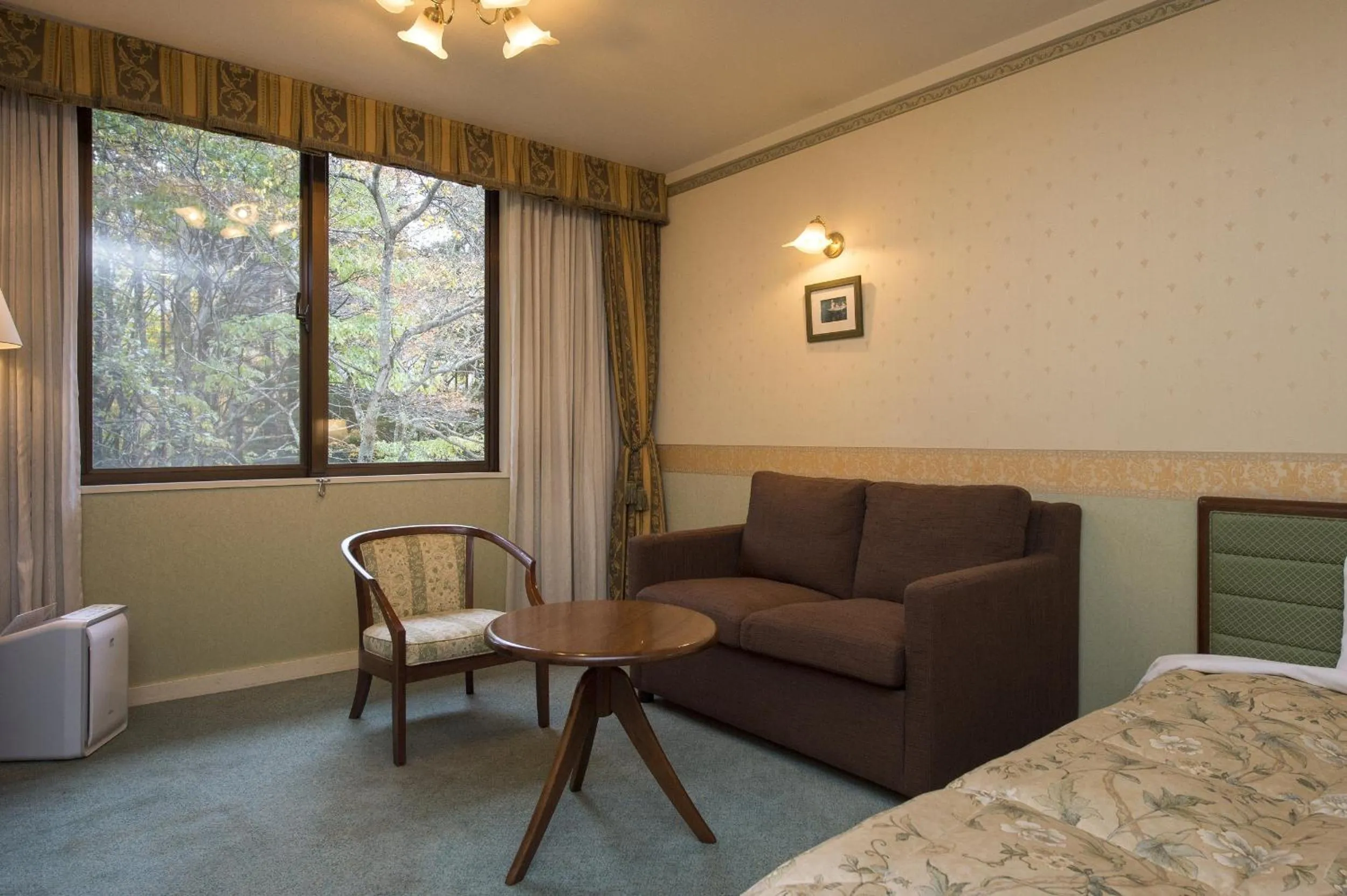 Bed in Takayama Wan Wan Paradise Hotel & Cottage