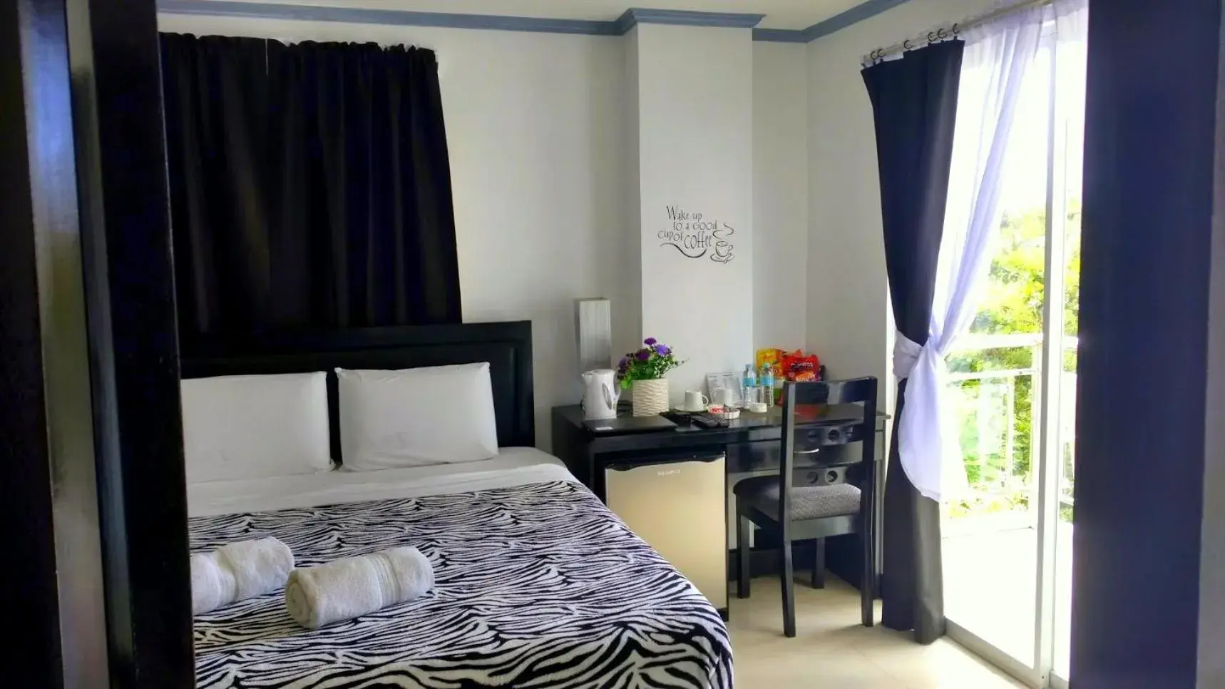 Deluxe Double Room with Garden View in Bohol South Beach Hotel Deluxe Double Room with Garden View in Bohol South Beach Hotel