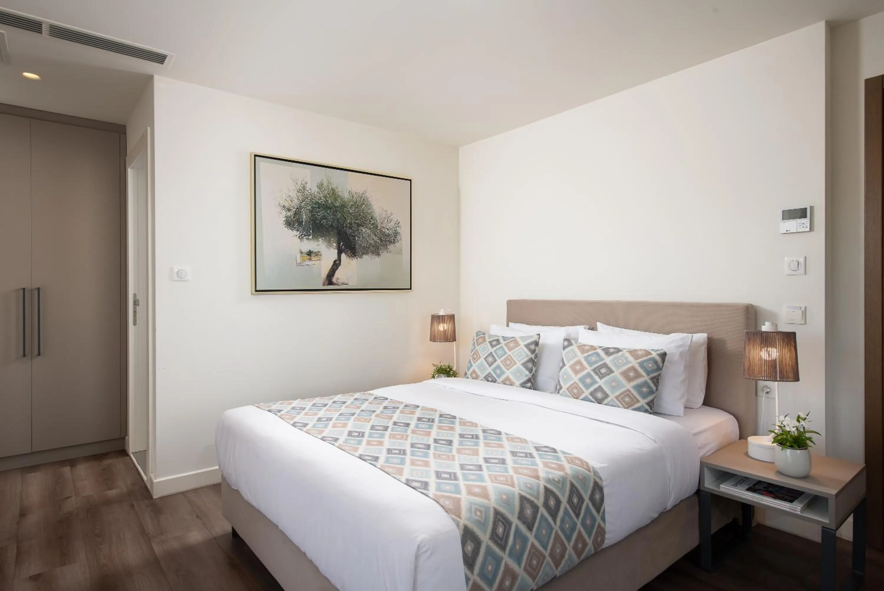 Bed in Urban Nest - Suites & Apartments