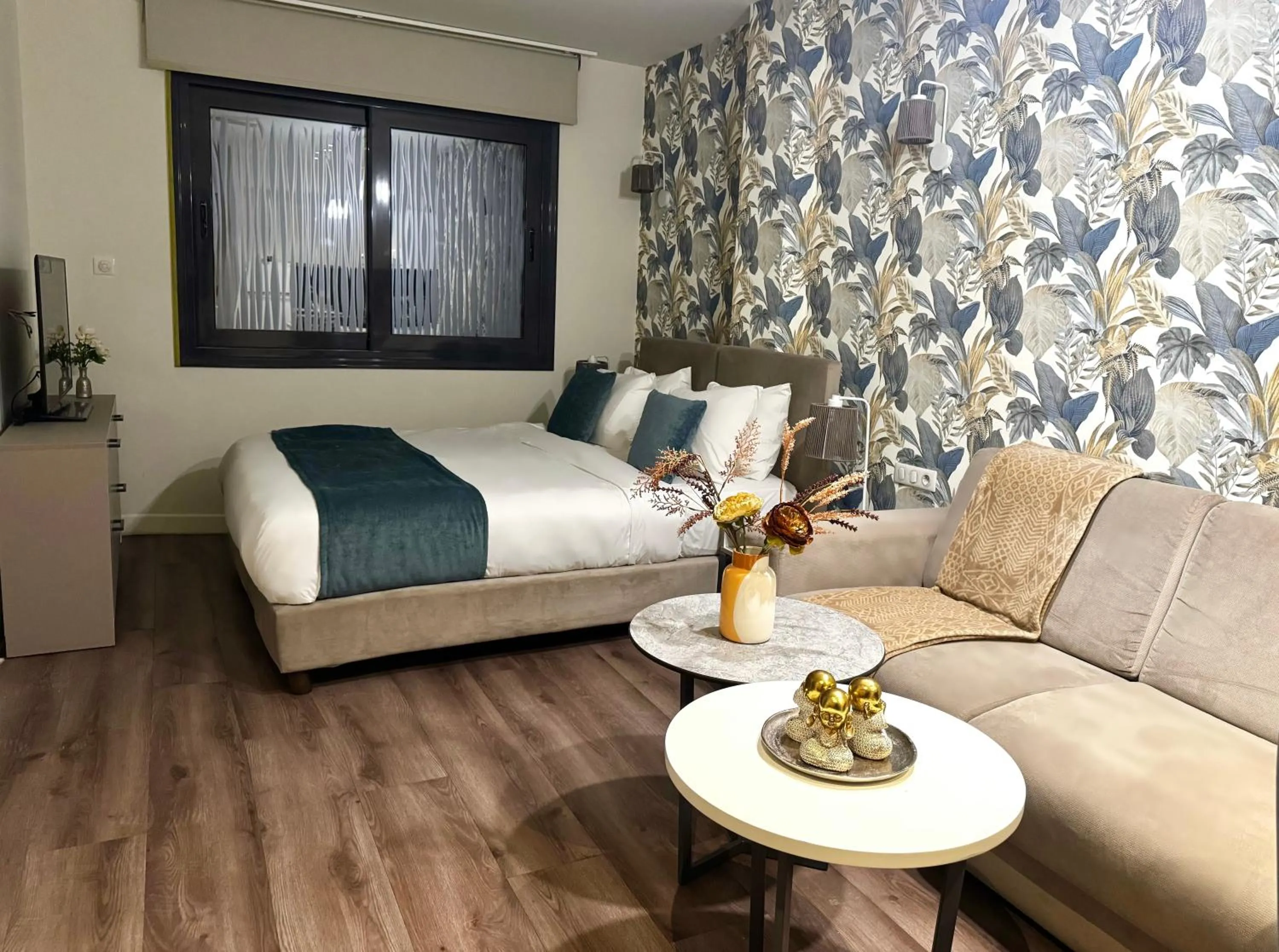 Living room, Bed in Urban Nest - Suites & Apartments