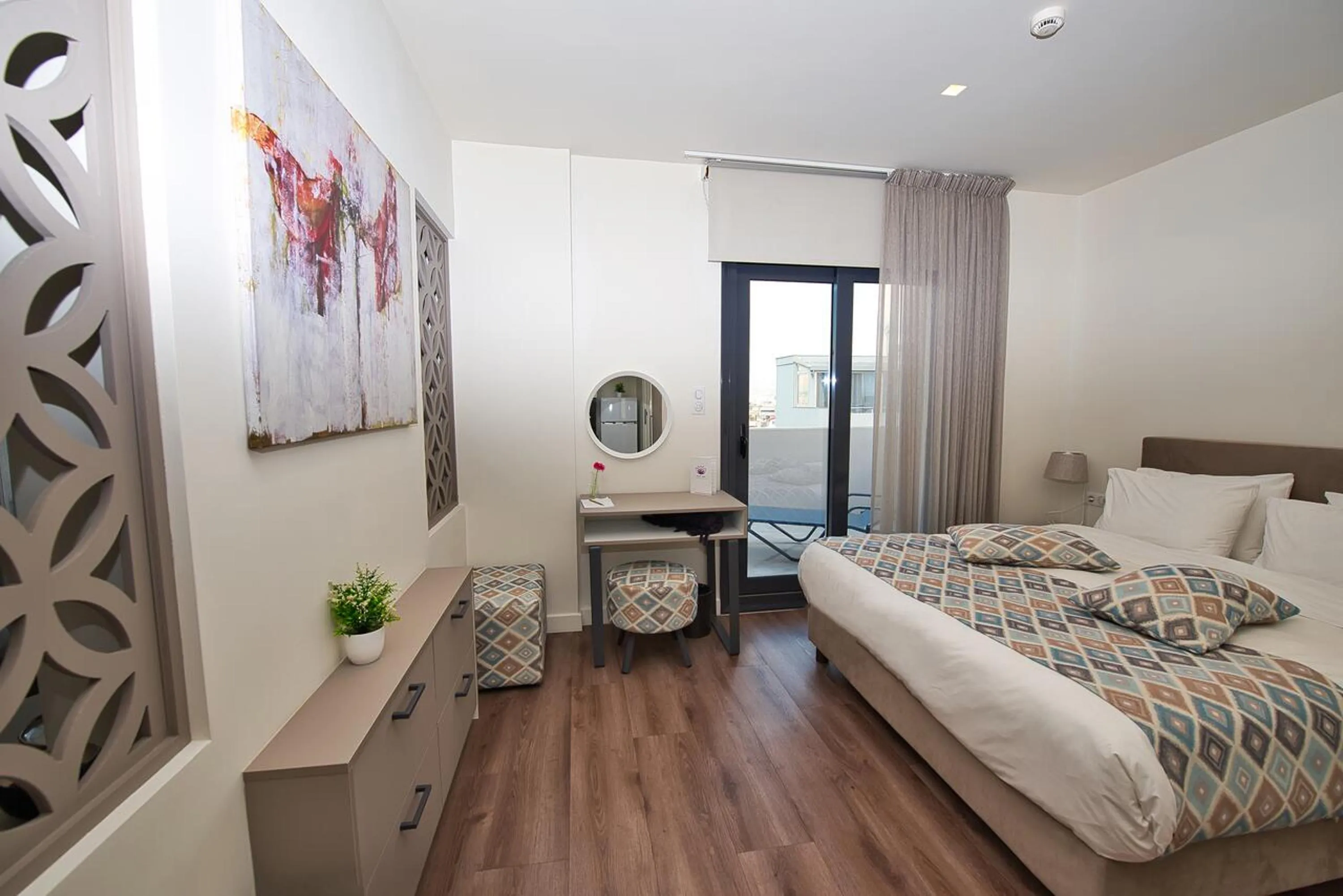 Bedroom, Bed in Urban Nest - Suites & Apartments