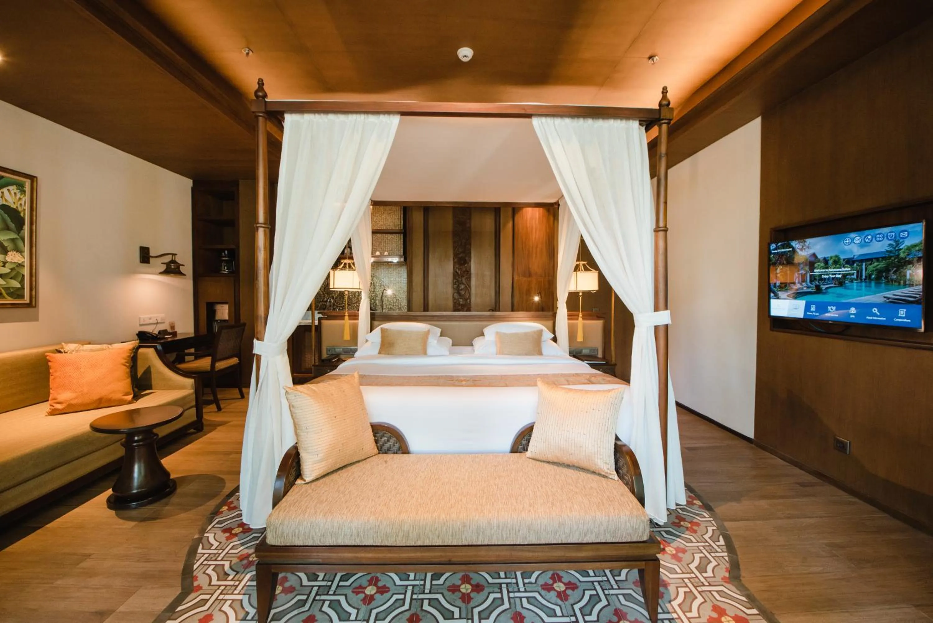 Bed in Ramayana Suites and Resort