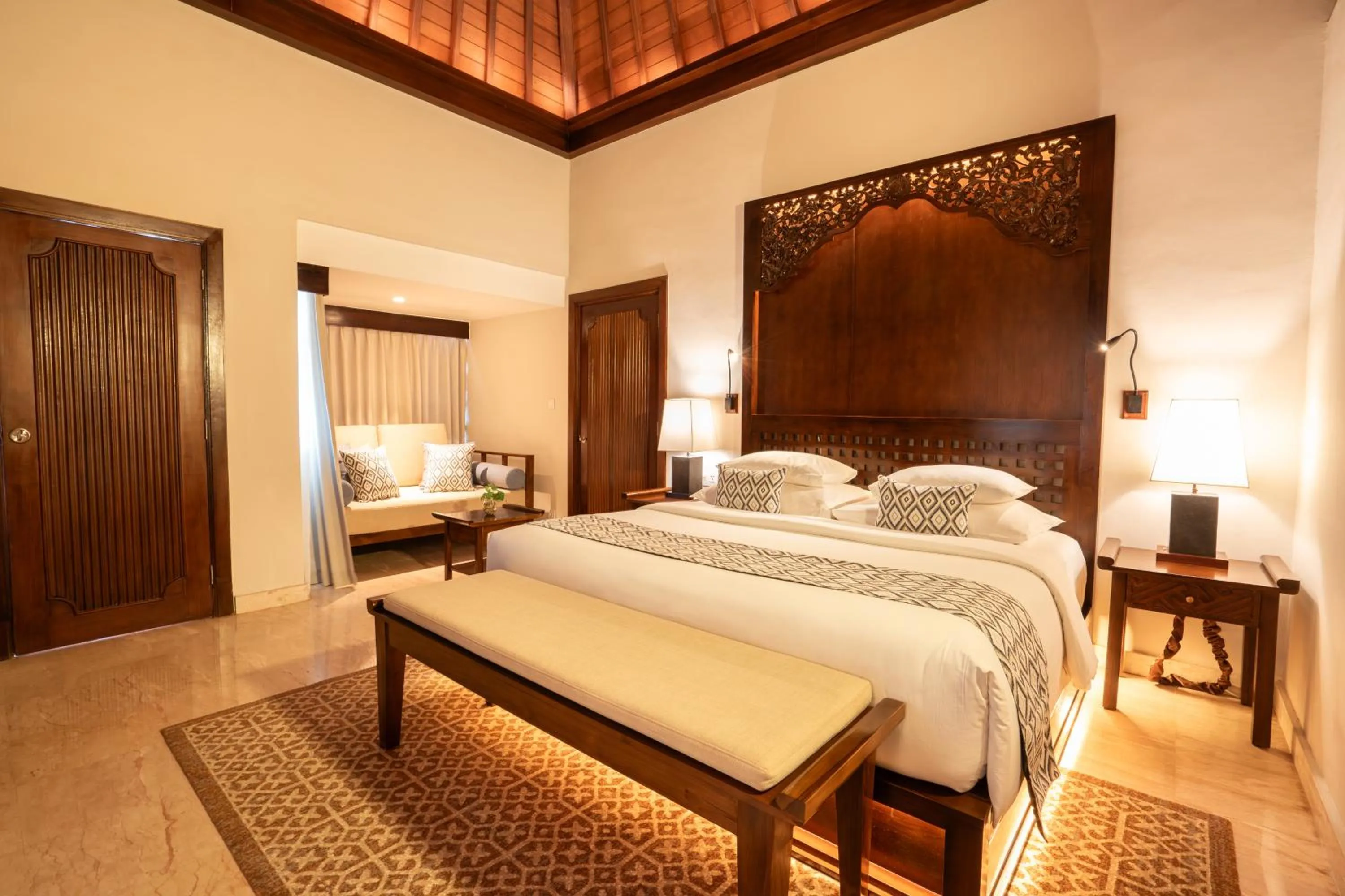 Bed in Ramayana Suites and Resort