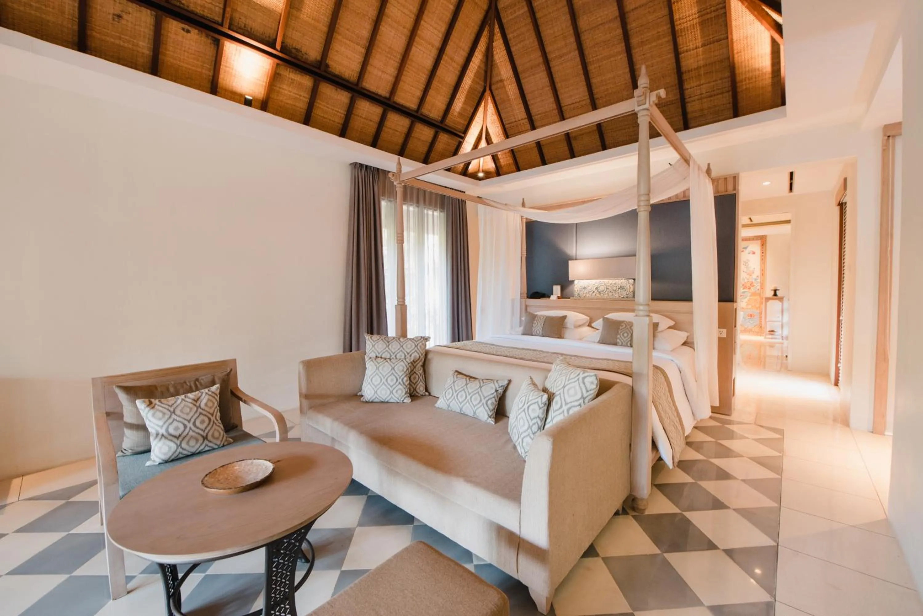 Bed in Ramayana Suites and Resort