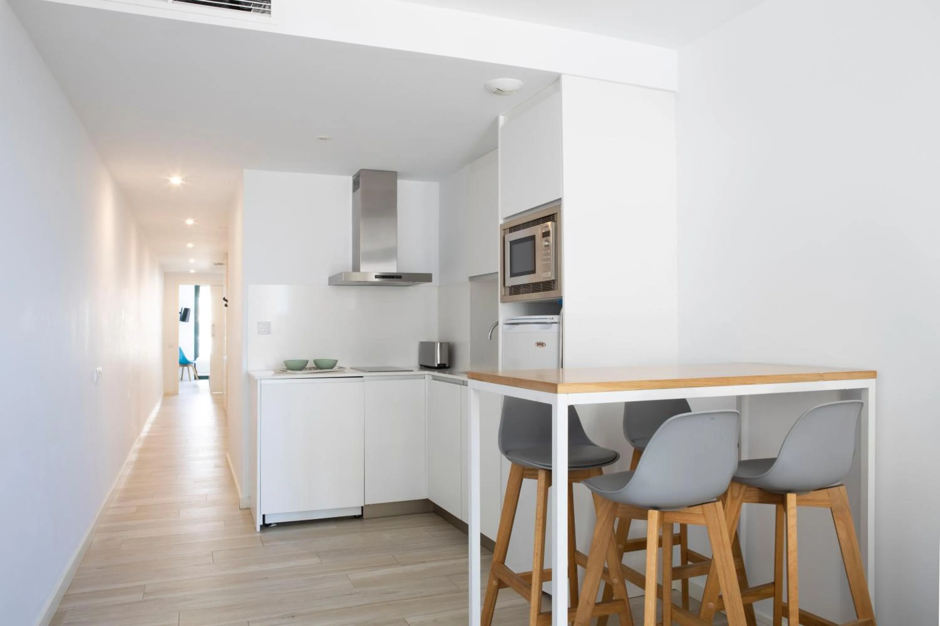 Kitchen or kitchenette in Urban Suites Sitges Apartments by PriorityVillas