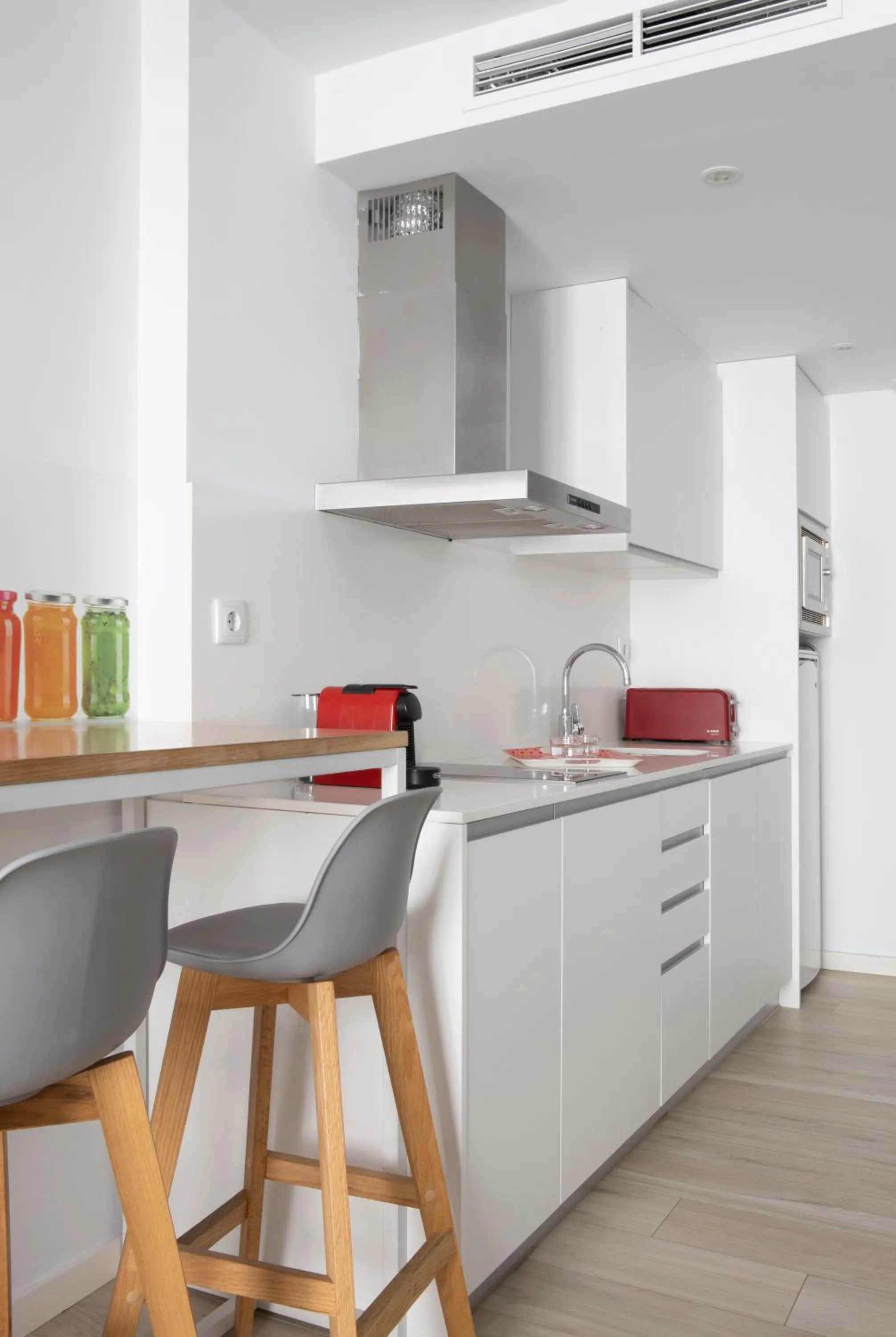 Kitchen or kitchenette in Urban Suites Sitges Apartments by PriorityVillas