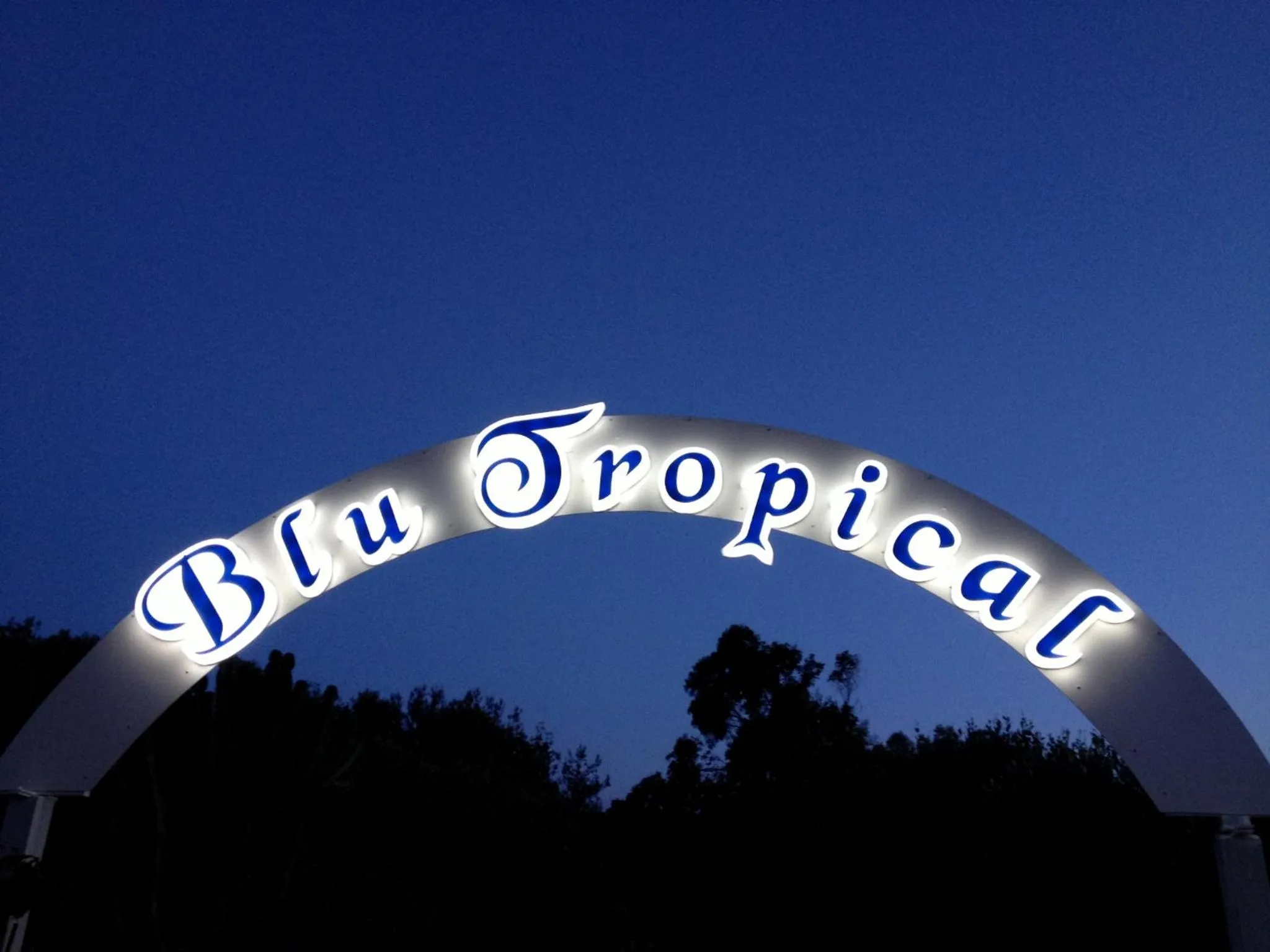 Property logo or sign in Blu Tropical Resort
