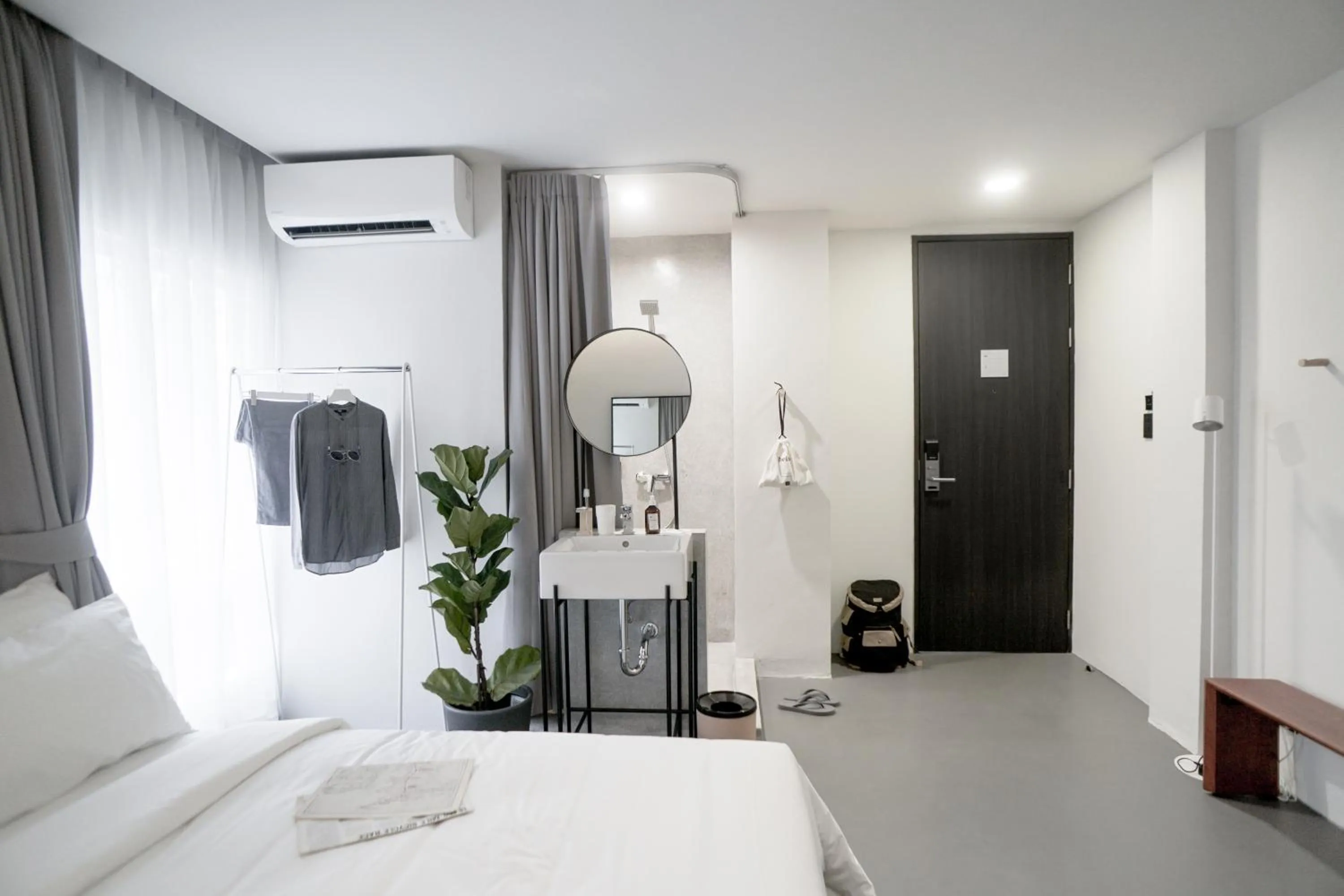 Photo of the whole room, Bed in Chocolate box mint