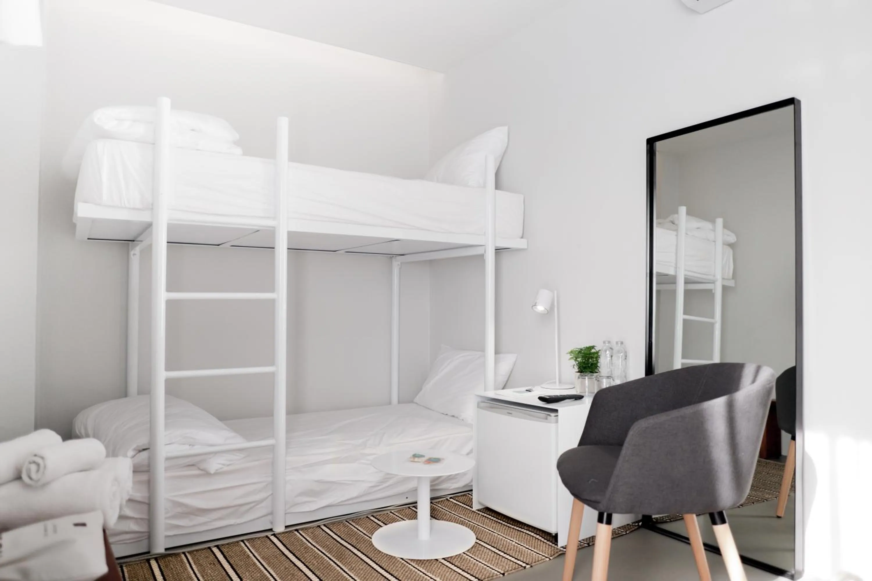 Photo of the whole room, Bed in Chocolate box mint