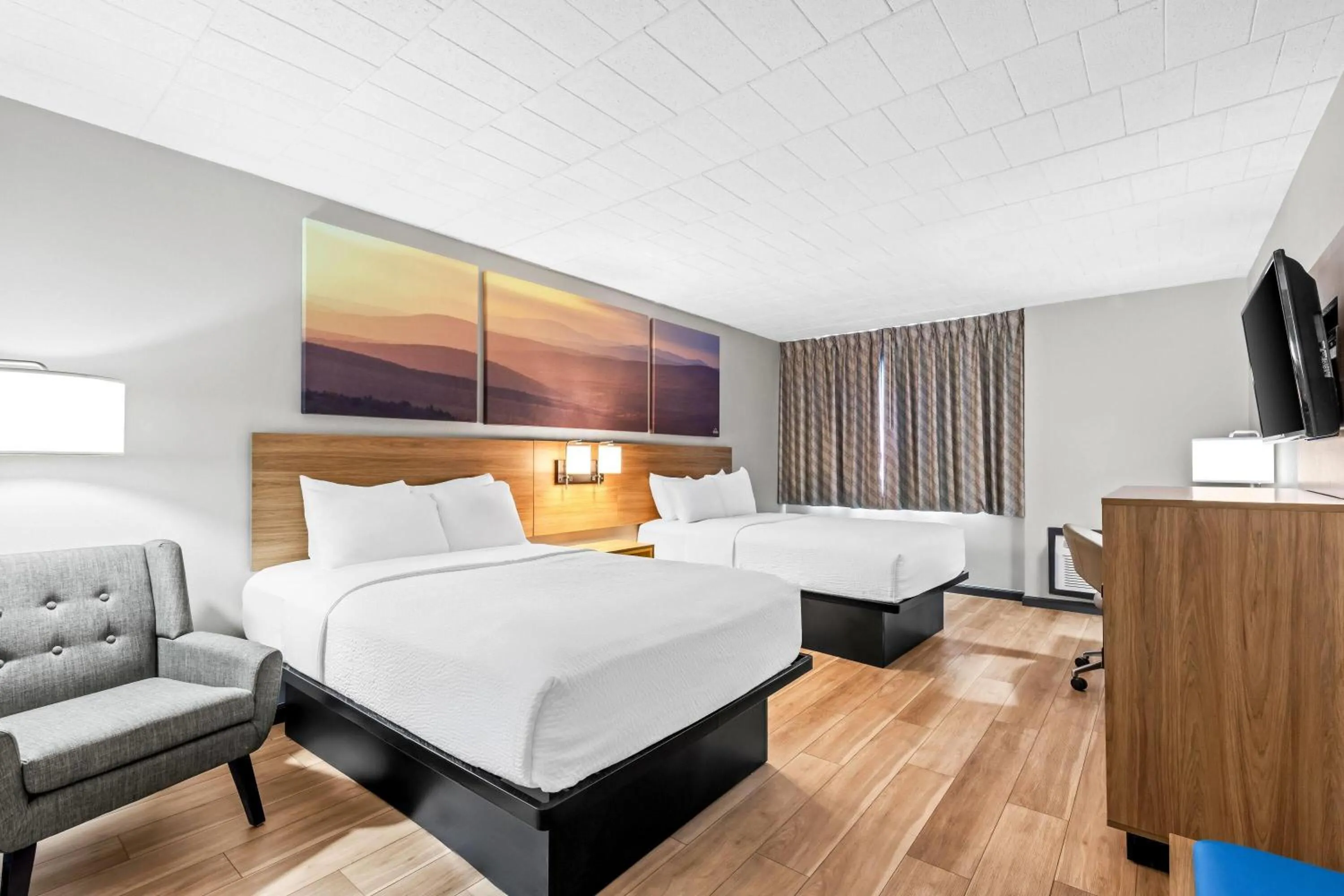 Bed in Days Inn by Wyndham Liberty