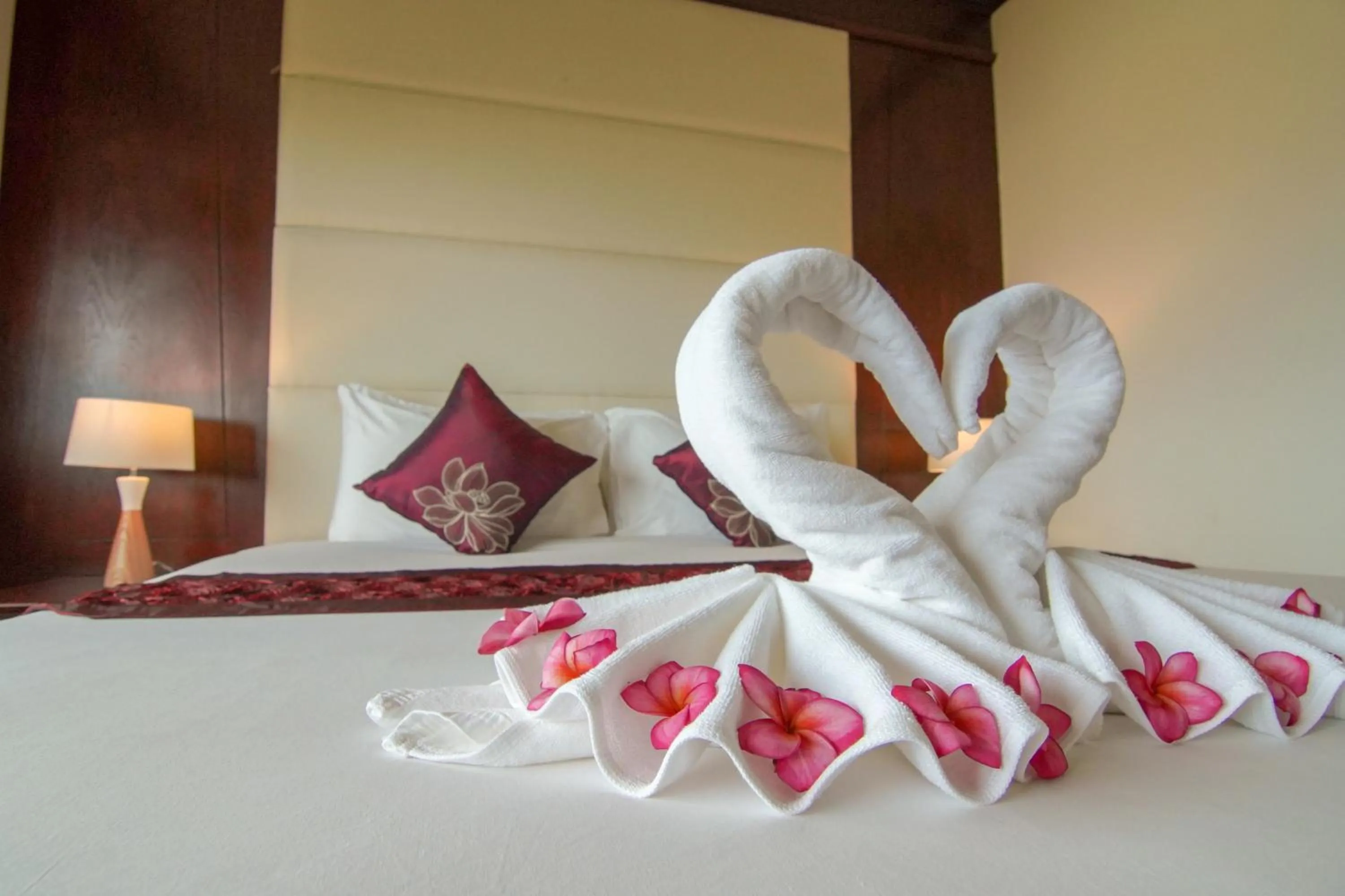 Bed in Arawan Riverside Hotel