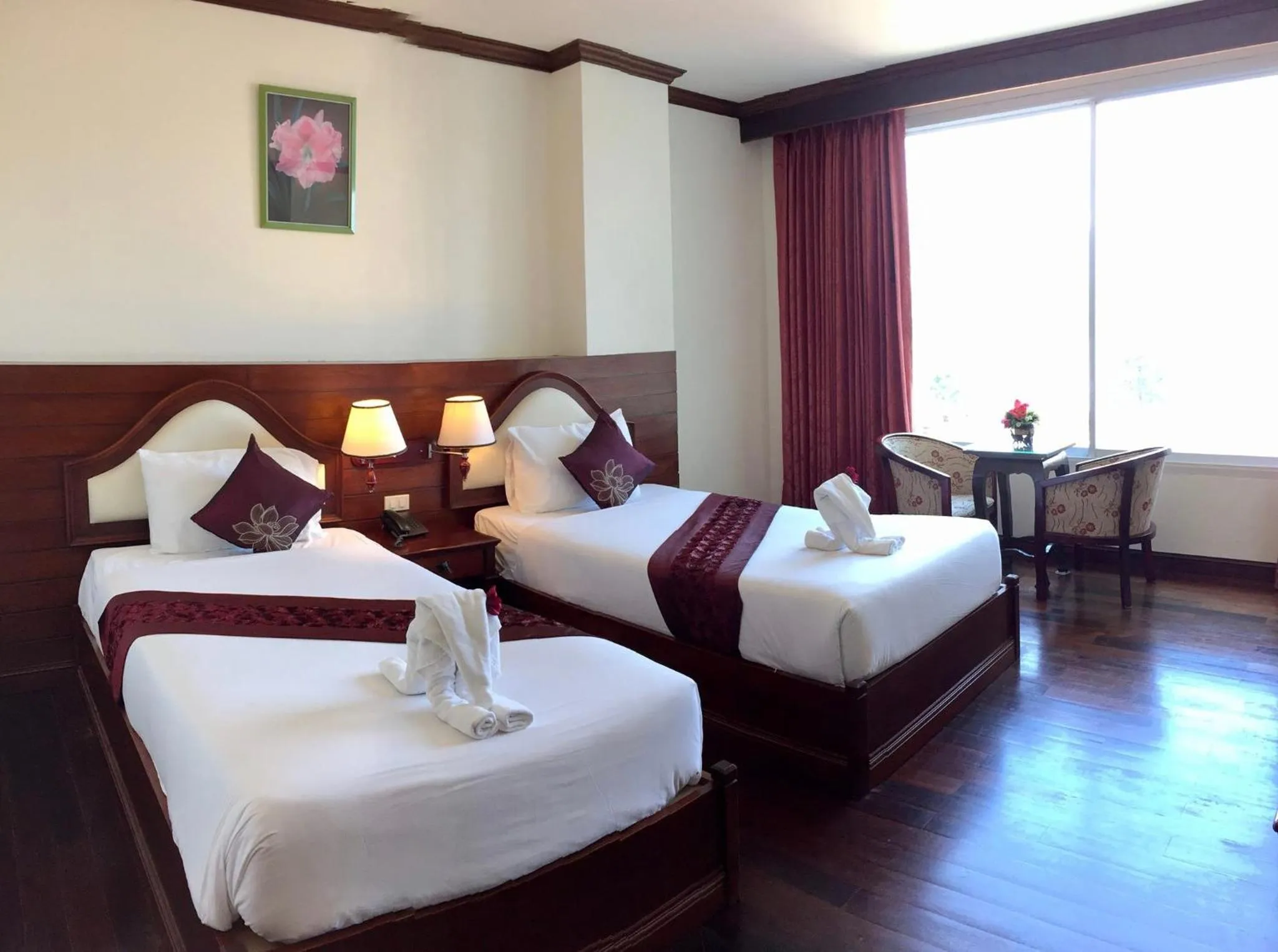 Photo of the whole room, Bed in Arawan Riverside Hotel