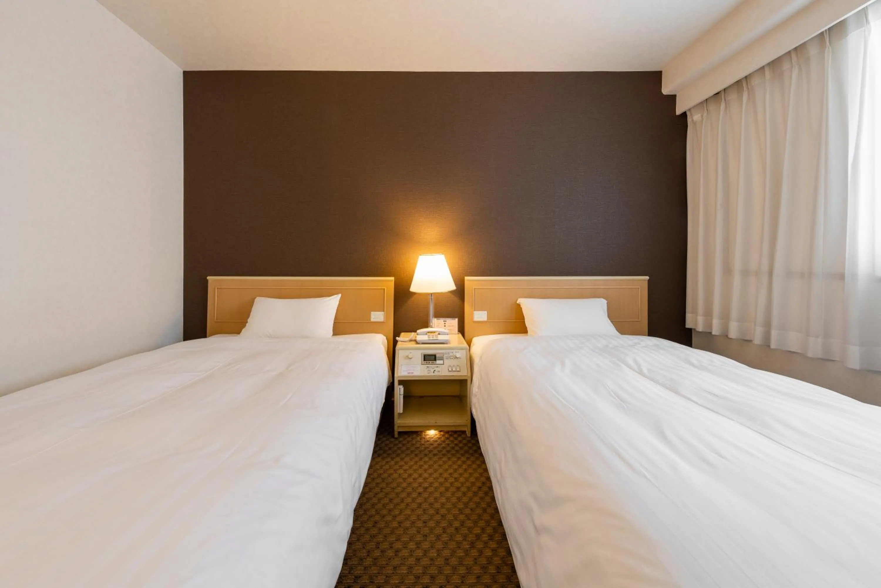 Bed in Okayama Washington Hotel Plaza