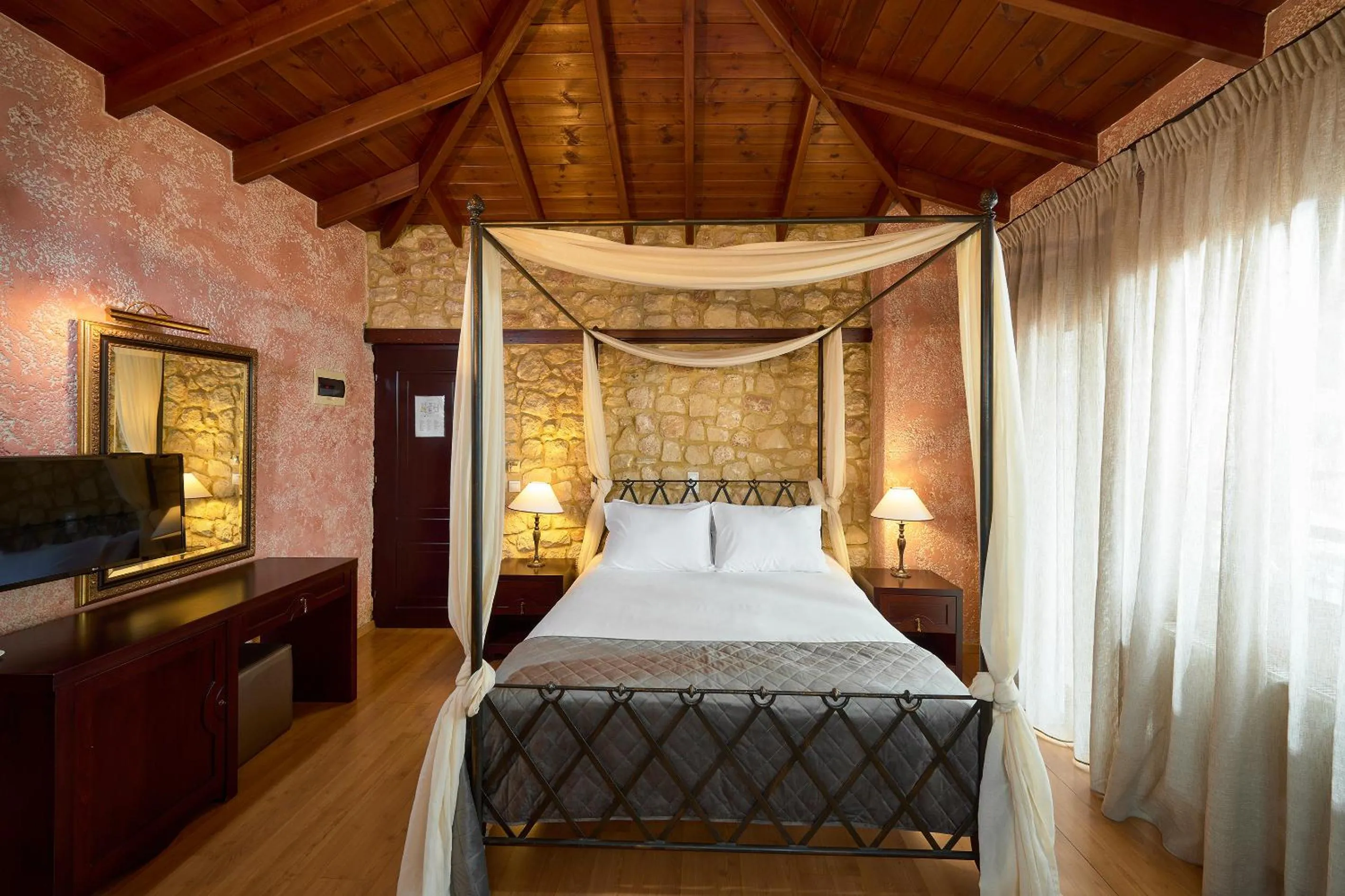 Bed in Olympus Mediterranean Boutique Hotel