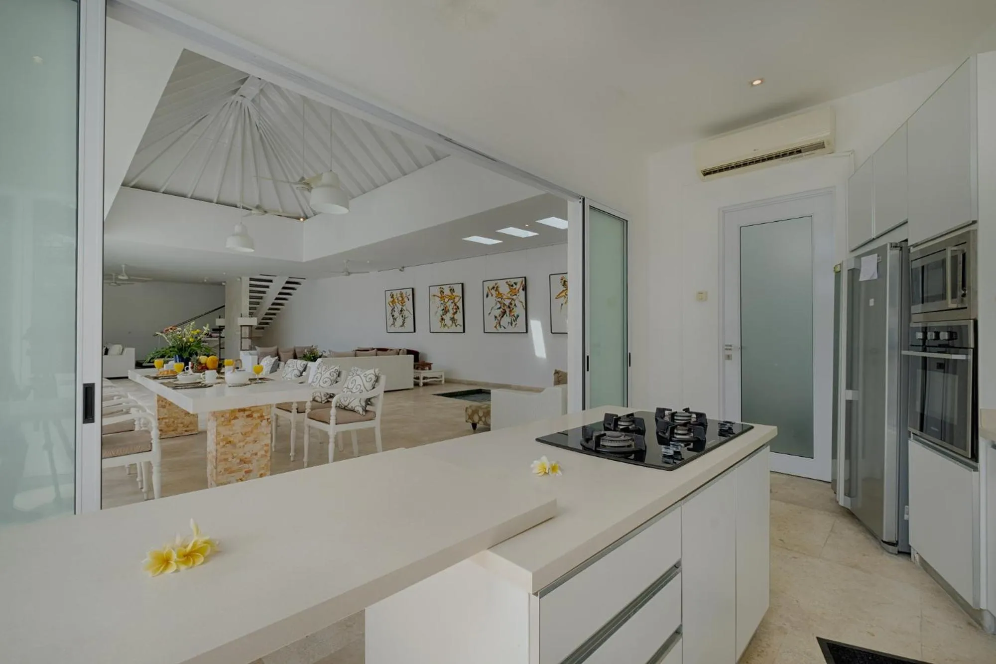 Kitchen or kitchenette in Canggu Villa by Sanga Sanga Hospitality