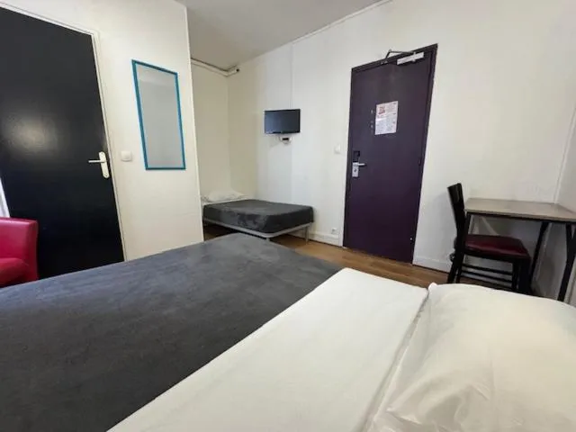 Bed in Hotel Chevallier