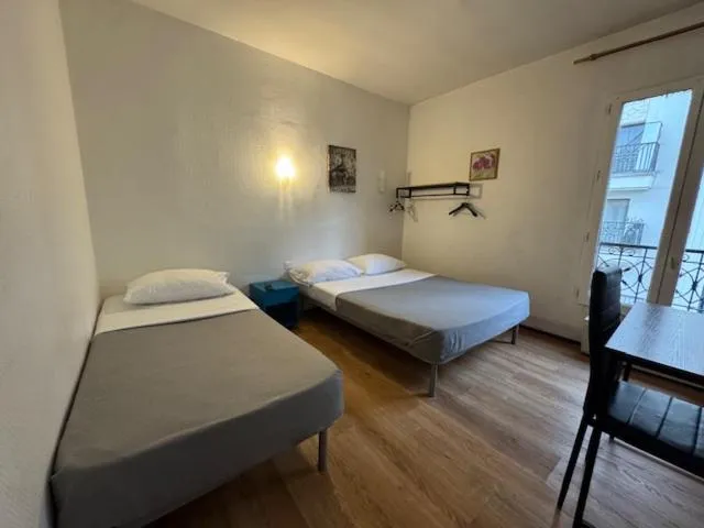 Bed in Hotel Chevallier