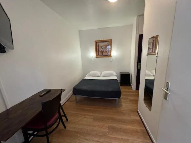 Bed in Hotel Chevallier