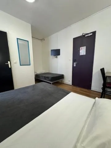 Bed in Hotel Chevallier