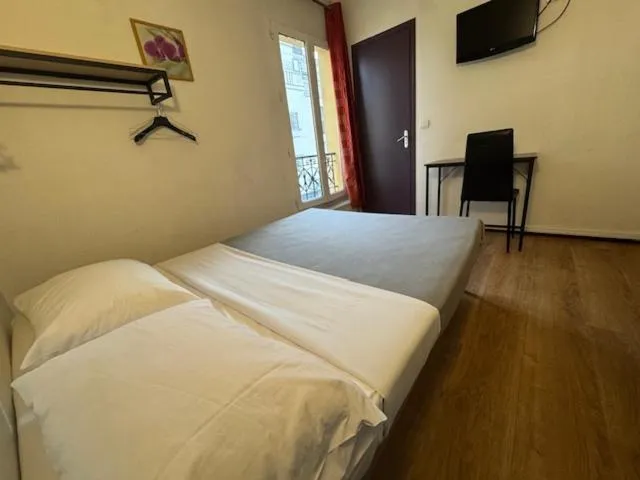 Bed in Hotel Chevallier