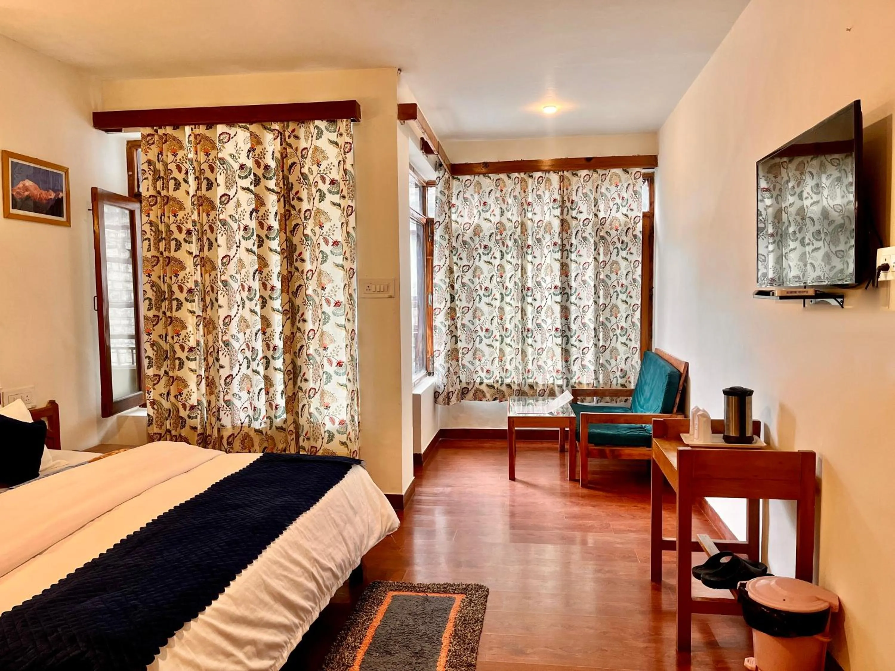 Photo of the whole room, Bed in Tourist Hotel 10 minutes walking distance from the mall