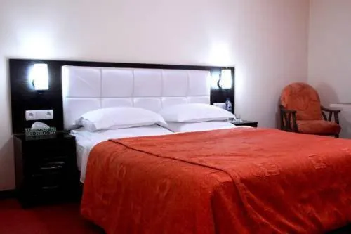 Bed in GRAND STAR HOTEL