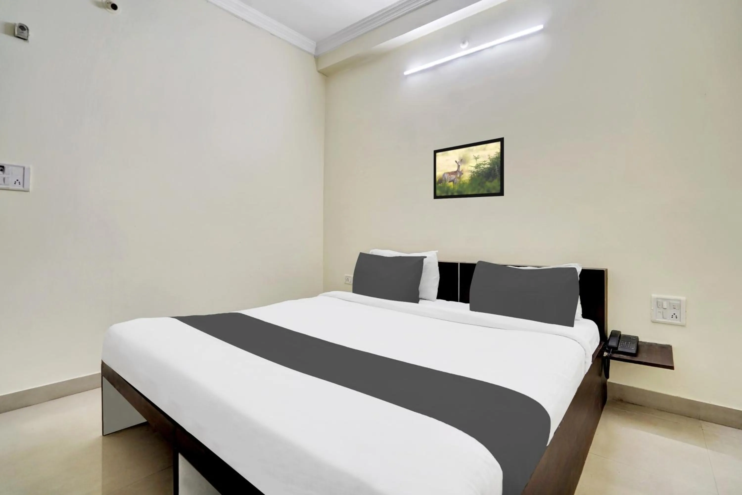 Bedroom, Bed in Super Hotel O Mani Bhai Patel
