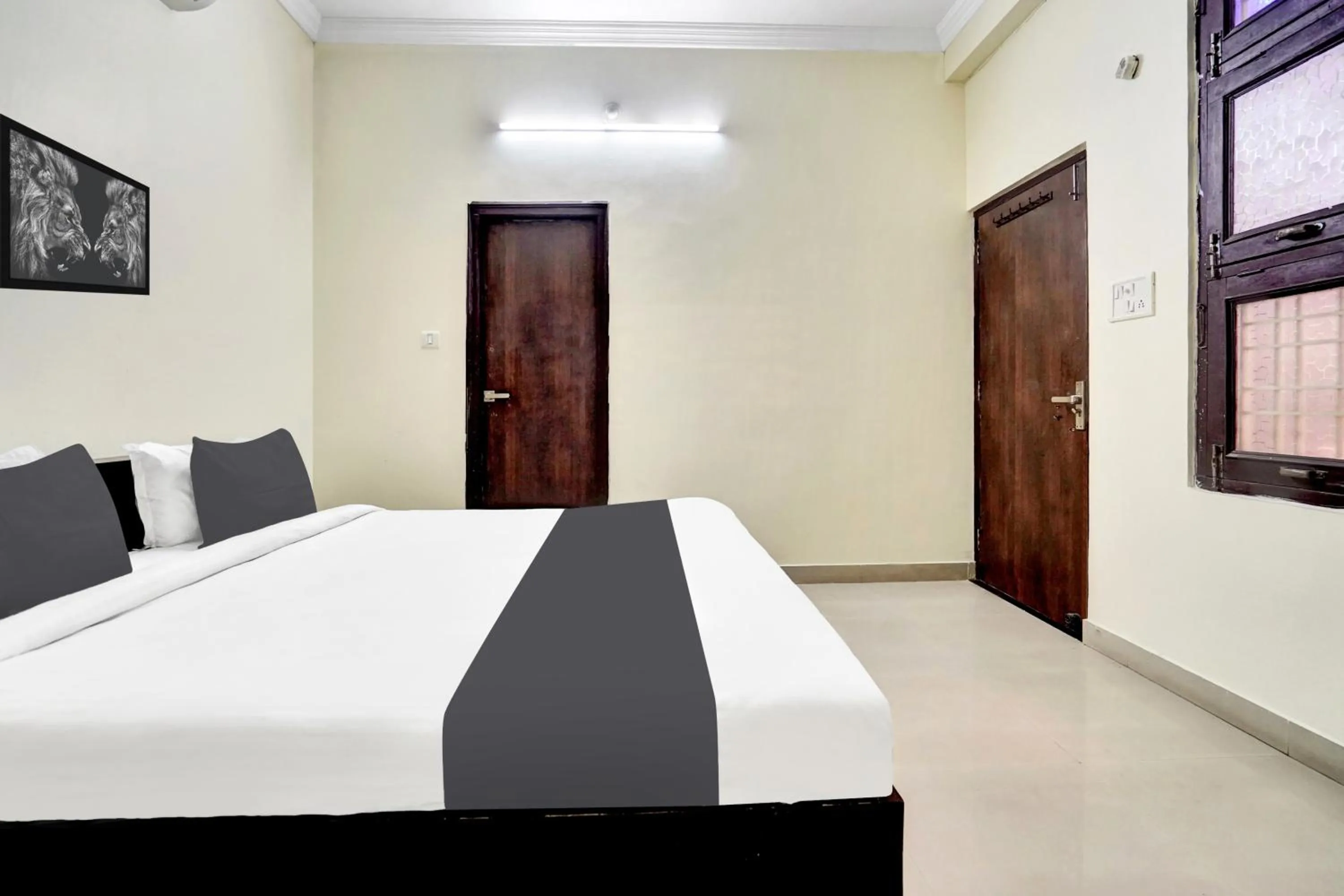 Bedroom, Bed in Super Hotel O Mani Bhai Patel