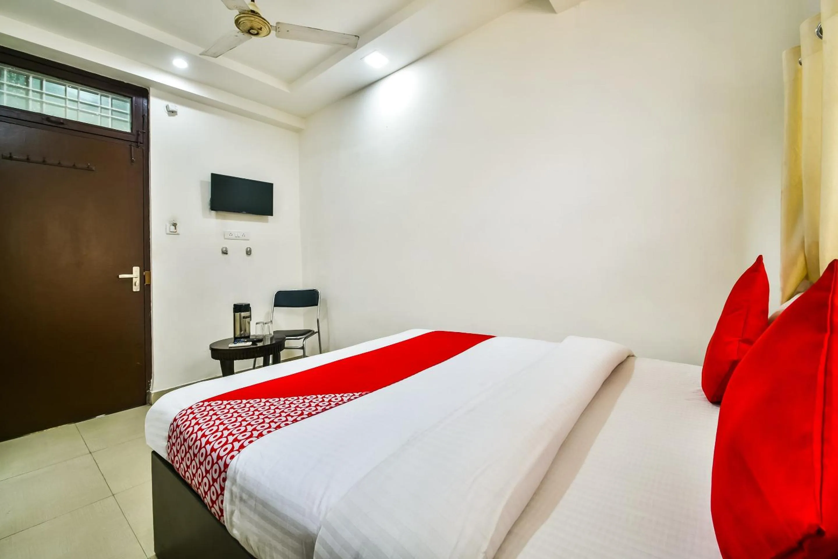 Bedroom in Hotel O Tirupati Residency Kota Airport