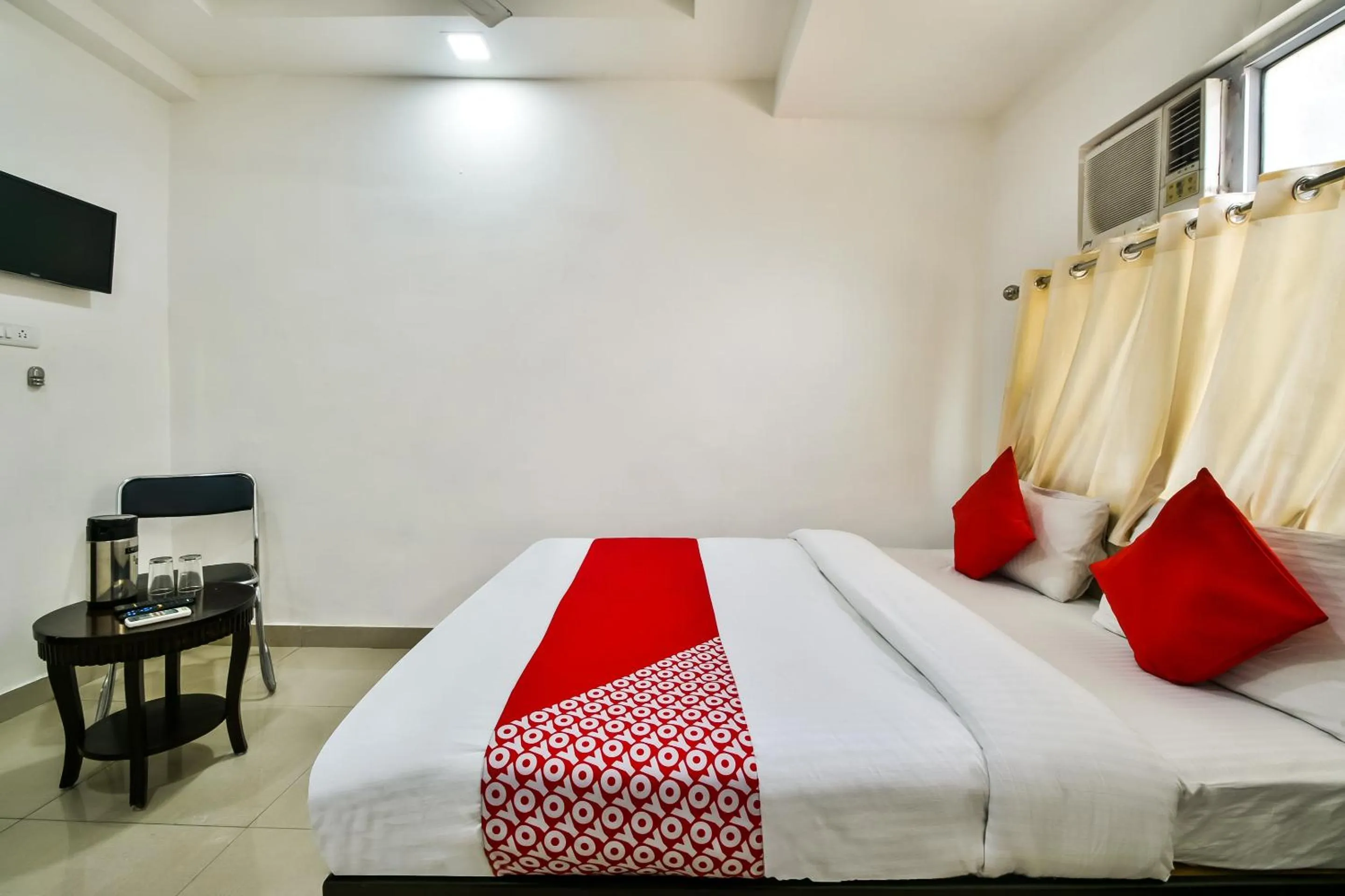 Bedroom in Hotel O Tirupati Residency Kota Airport