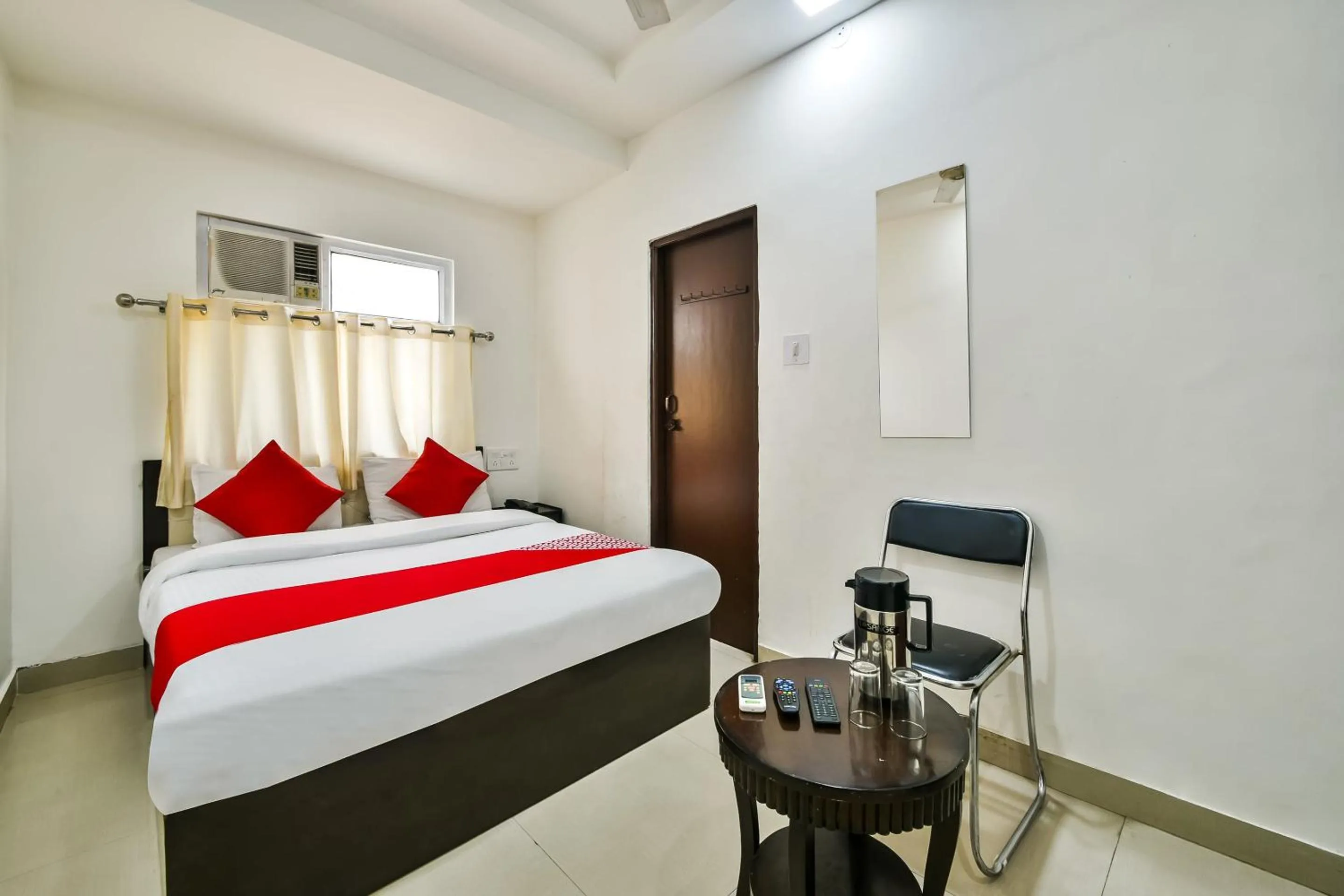 Bedroom in Hotel O Tirupati Residency Kota Airport