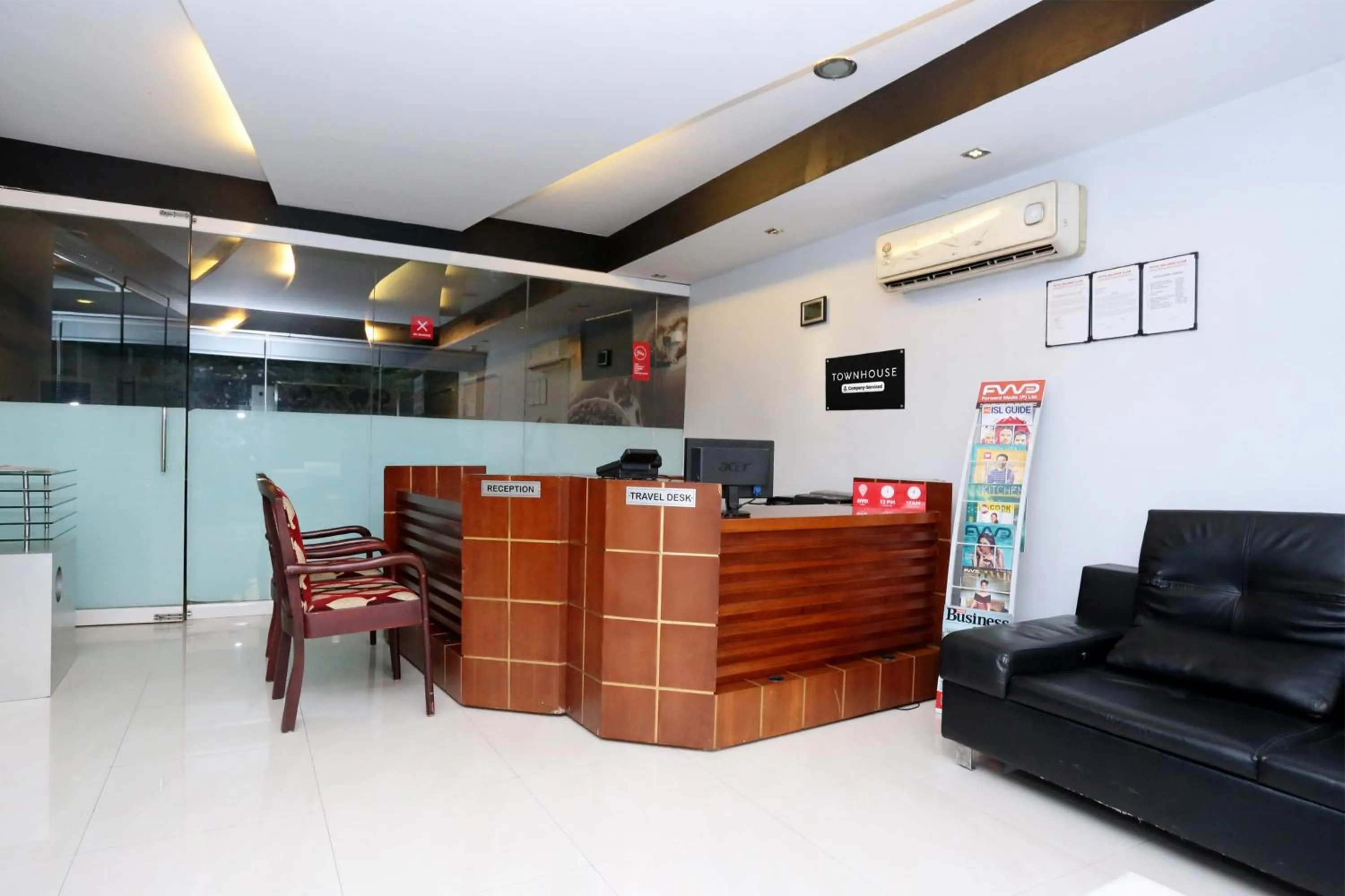 Lobby or reception in Super Townhouse Malabar Illam