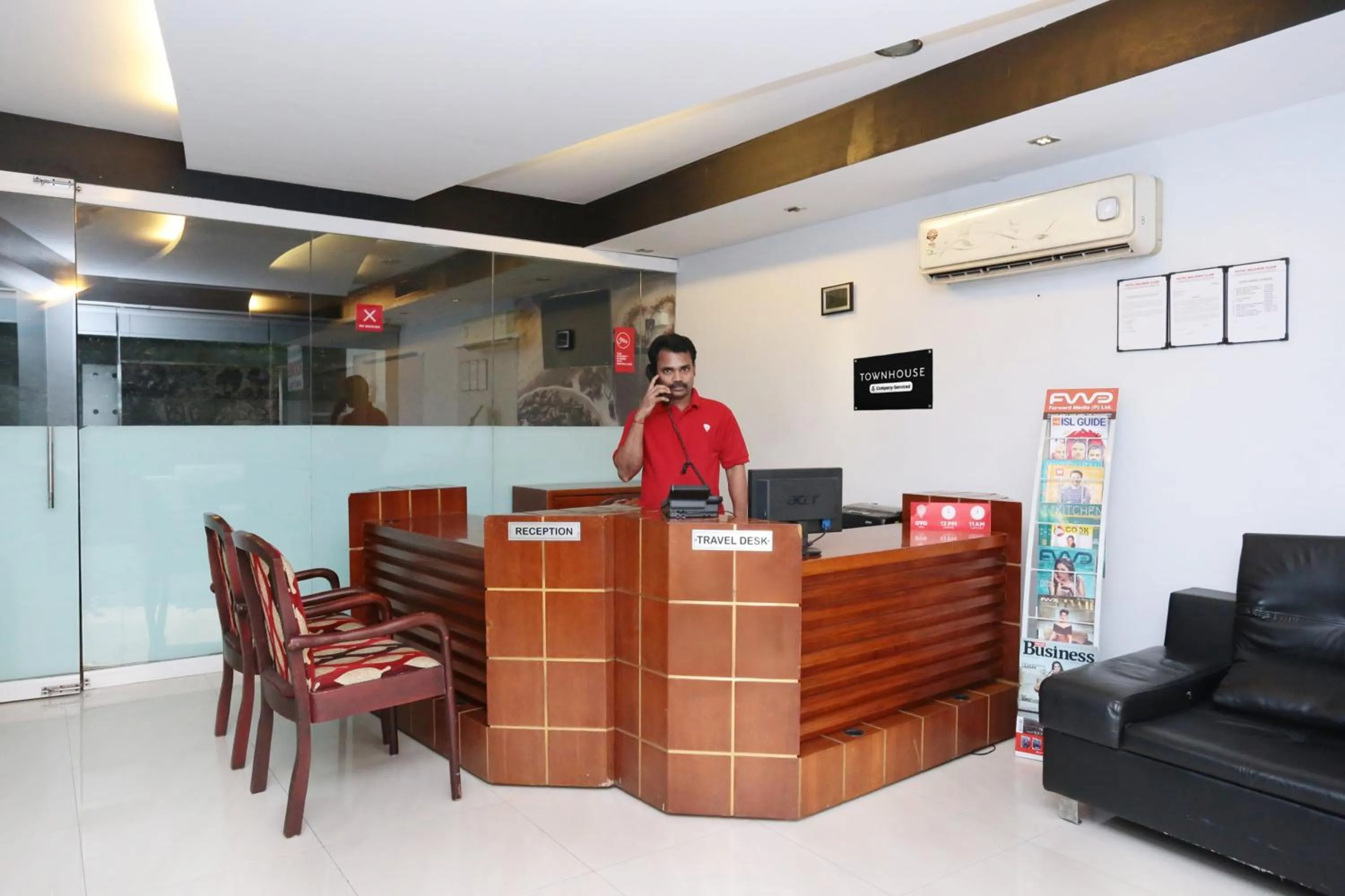 Lobby or reception in Super Townhouse Malabar Illam