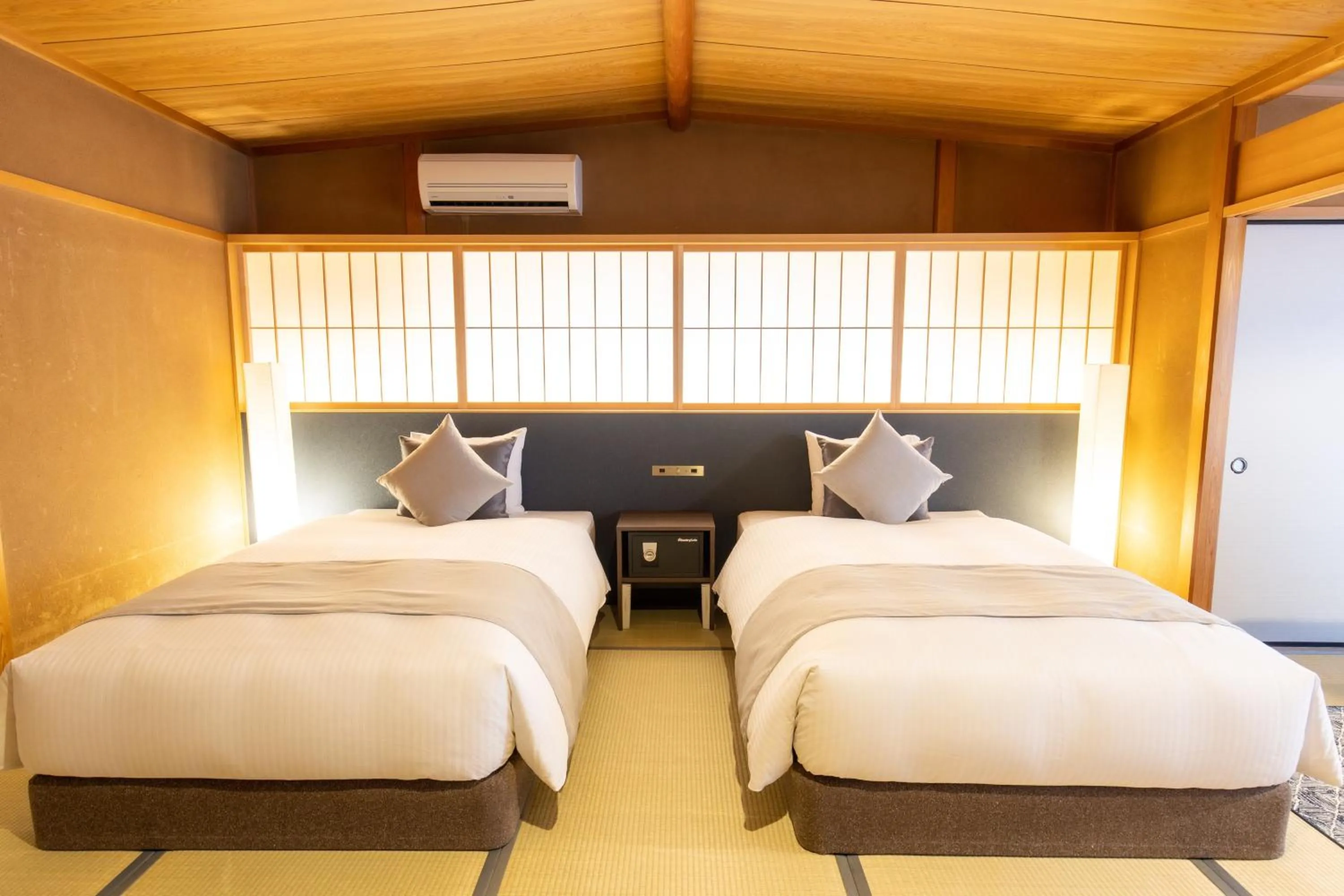 Bed in Kona Stay Bicycle Resort