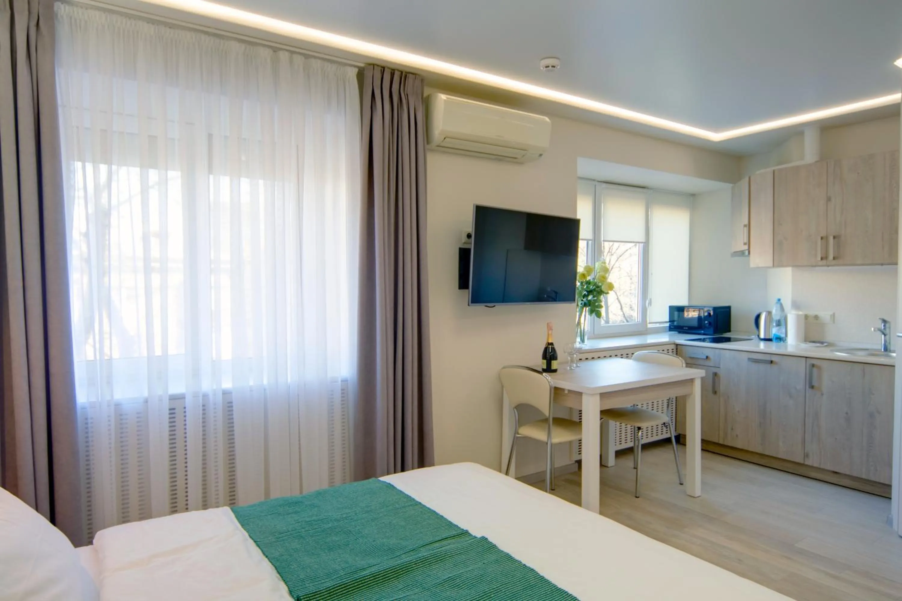 Communal lounge/ TV room, Bed in Arena Summit Apart Hotel