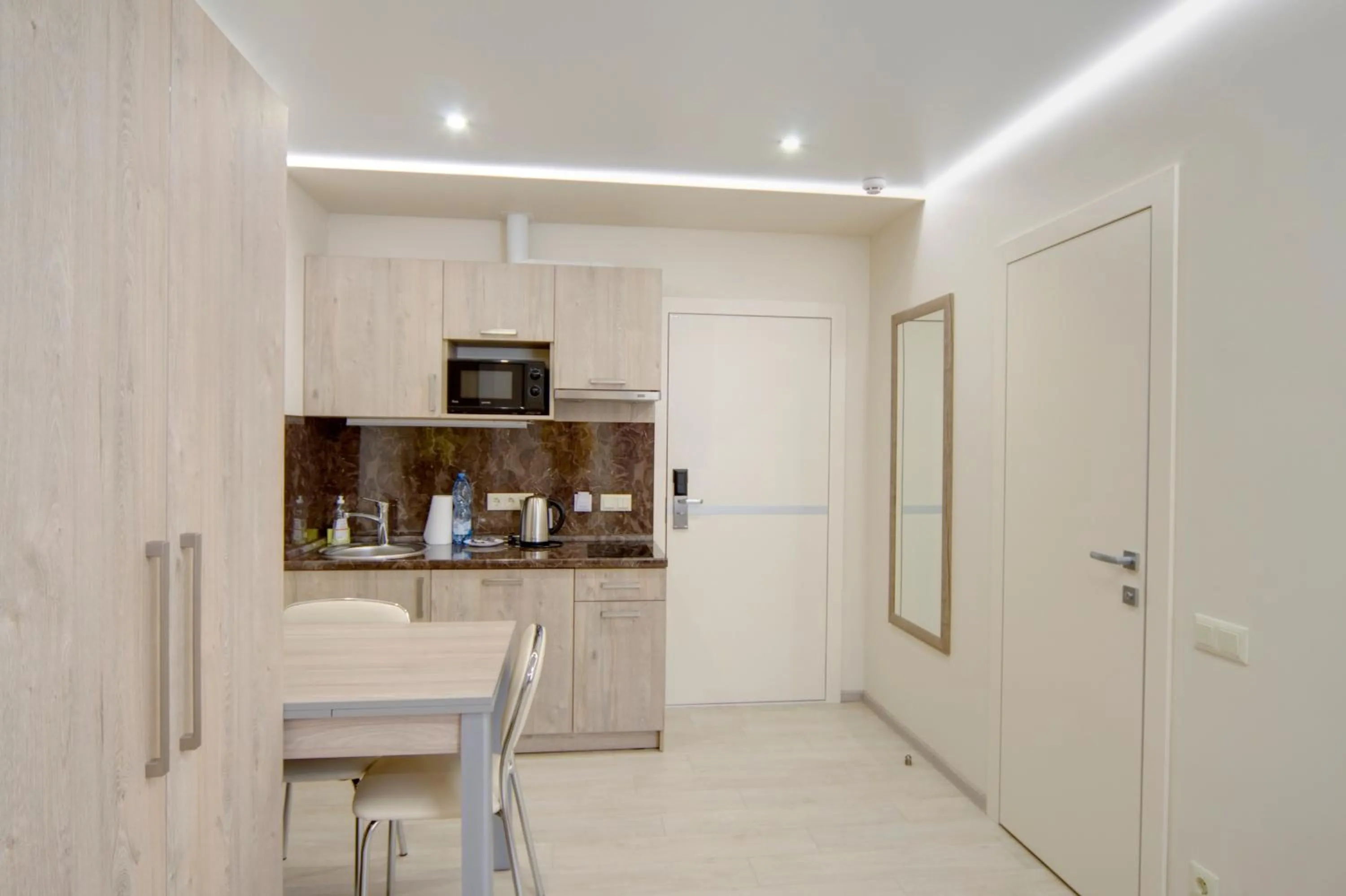 Kitchen or kitchenette in Arena Summit Apart Hotel