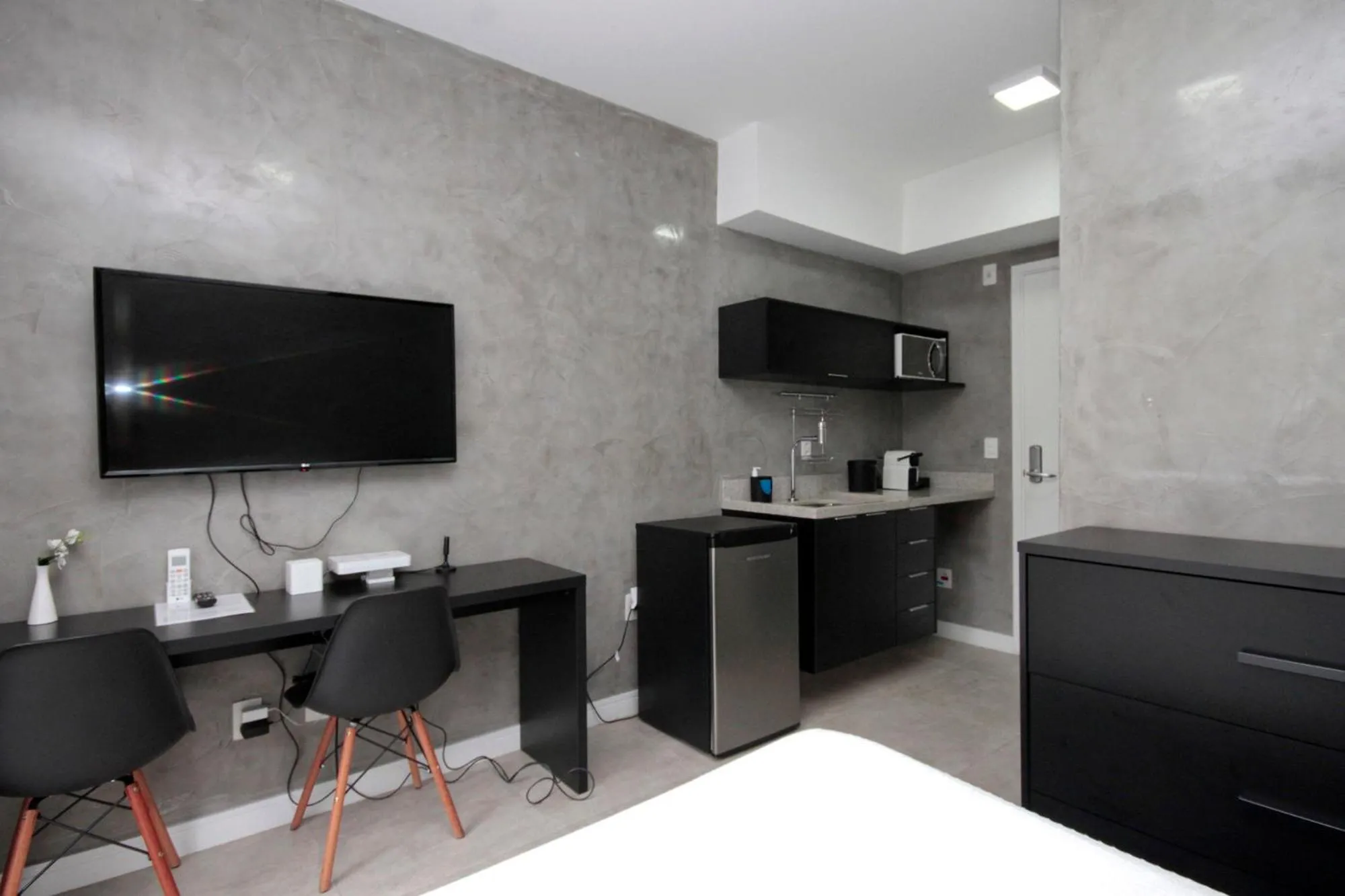 Communal lounge/ TV room in 360 Luz